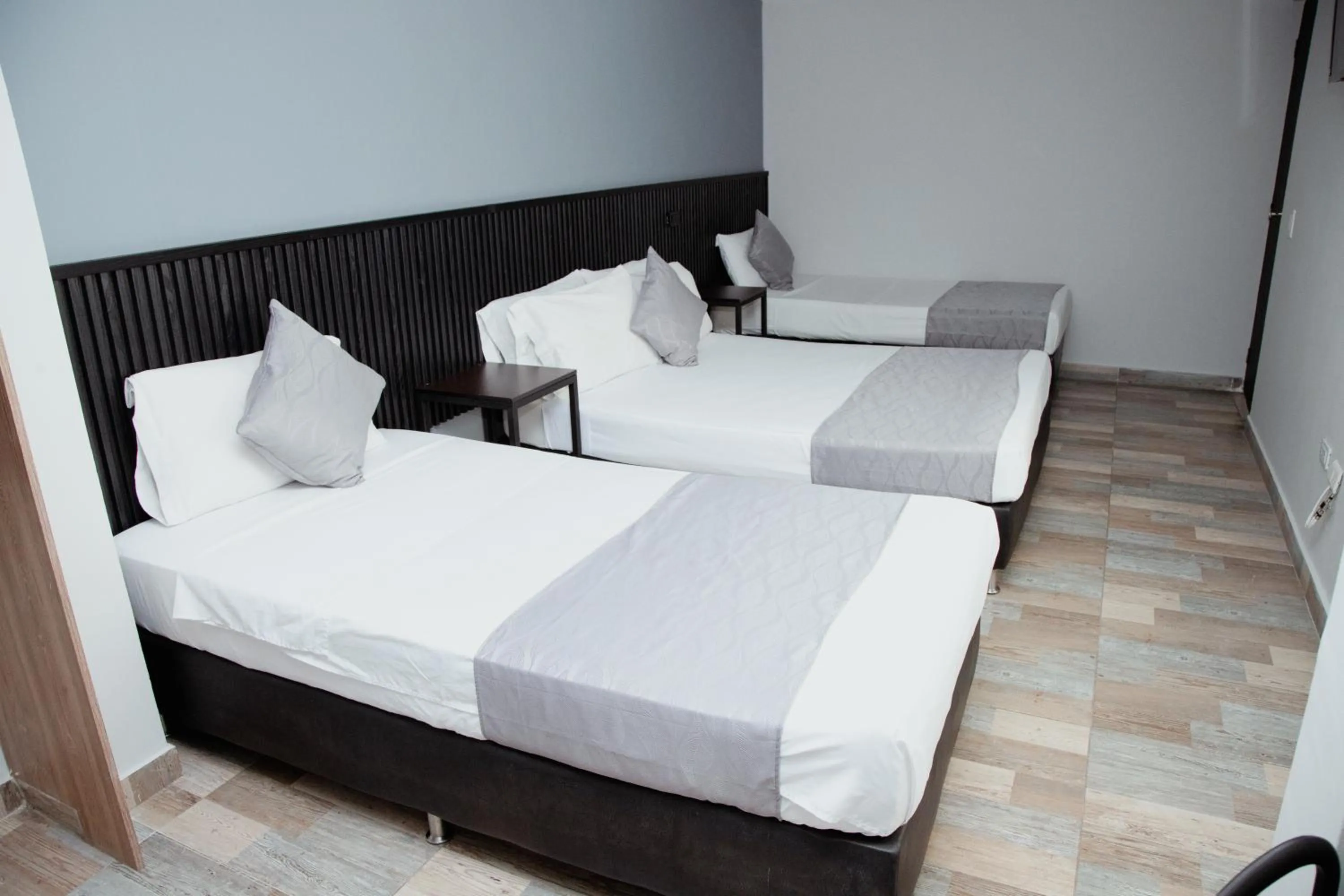 Bed in Hotel Palmas del Estadio