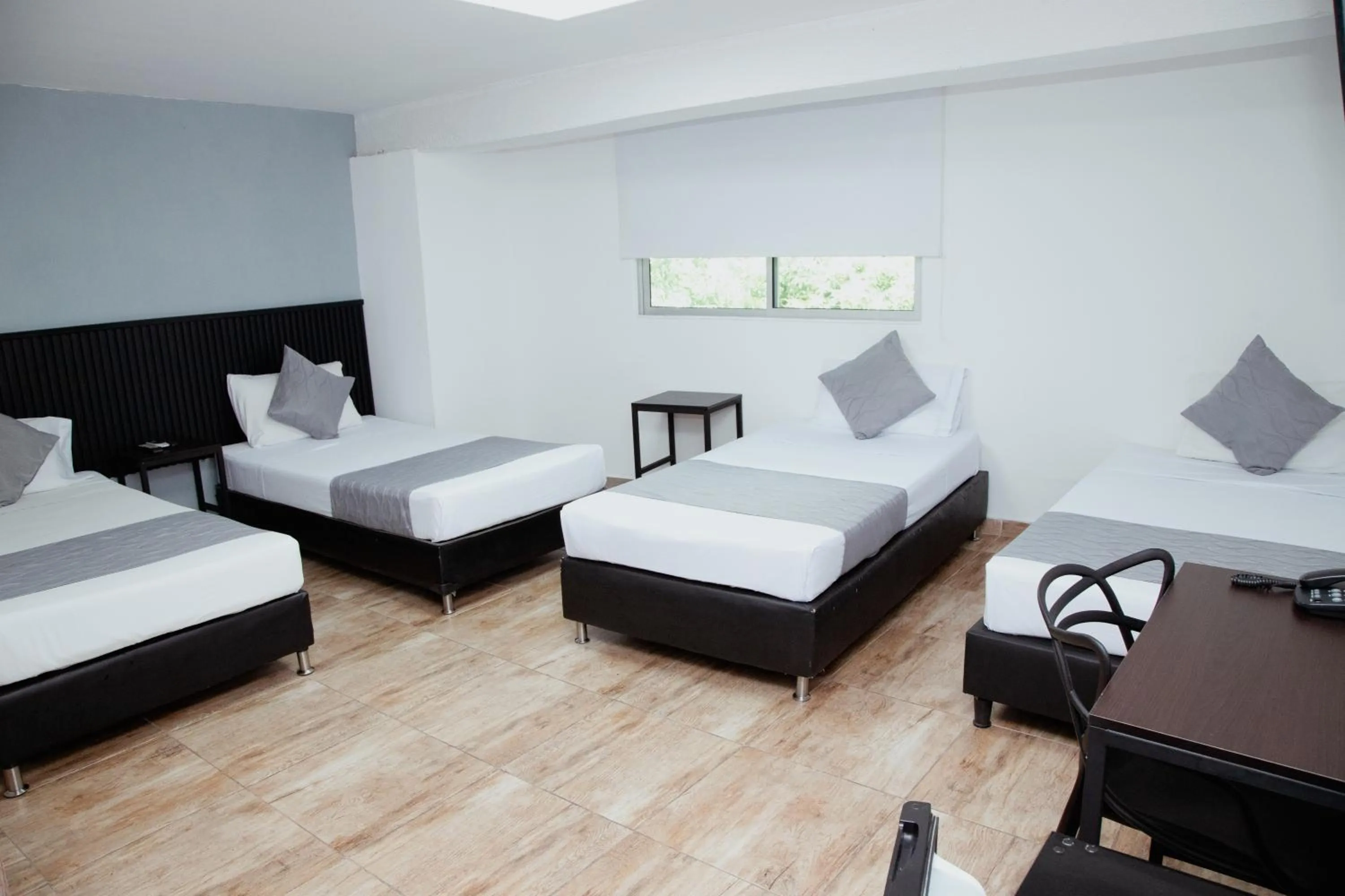 Bed in Hotel Palmas del Estadio