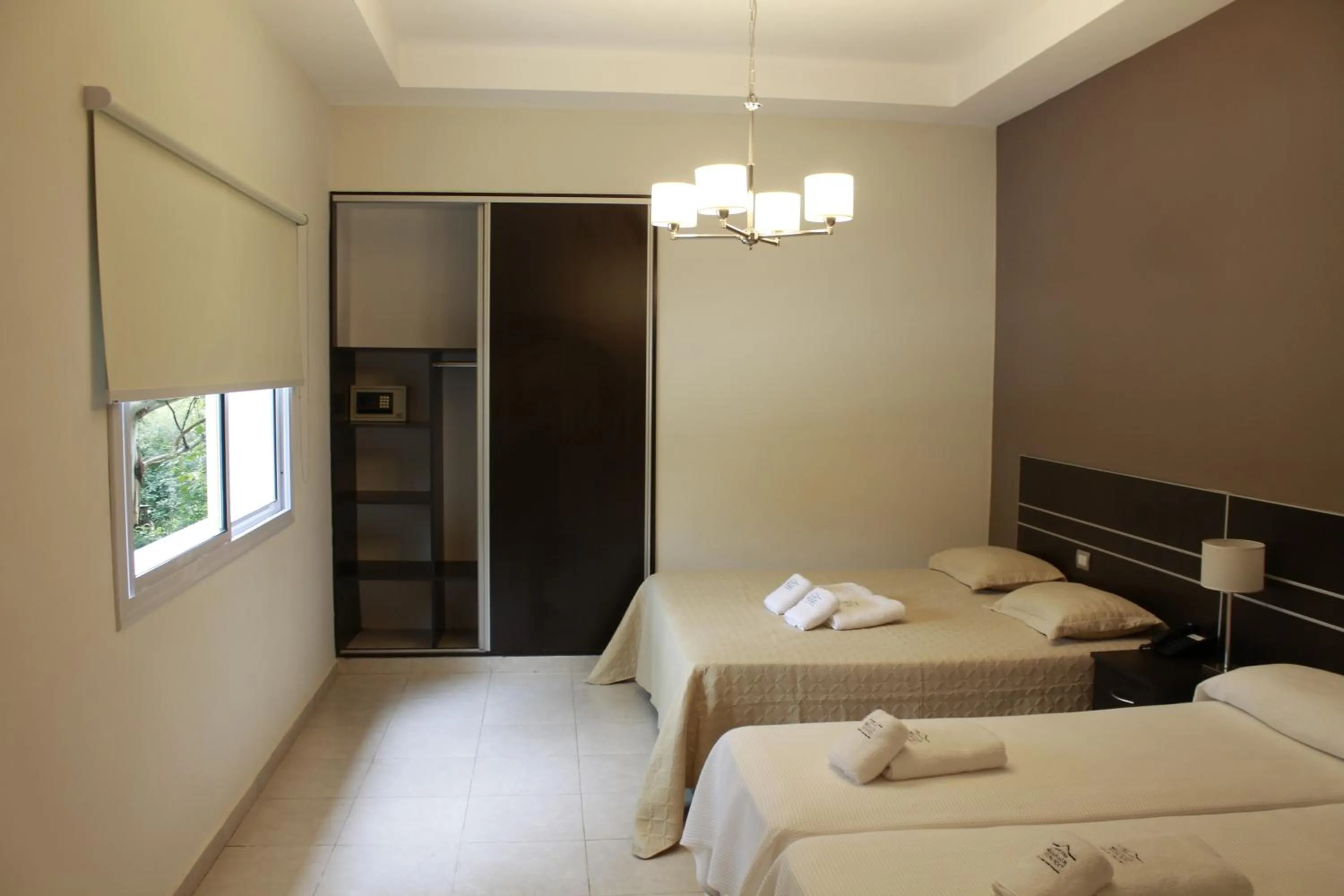 Bed in Hostería Atahualpa Yupanqui