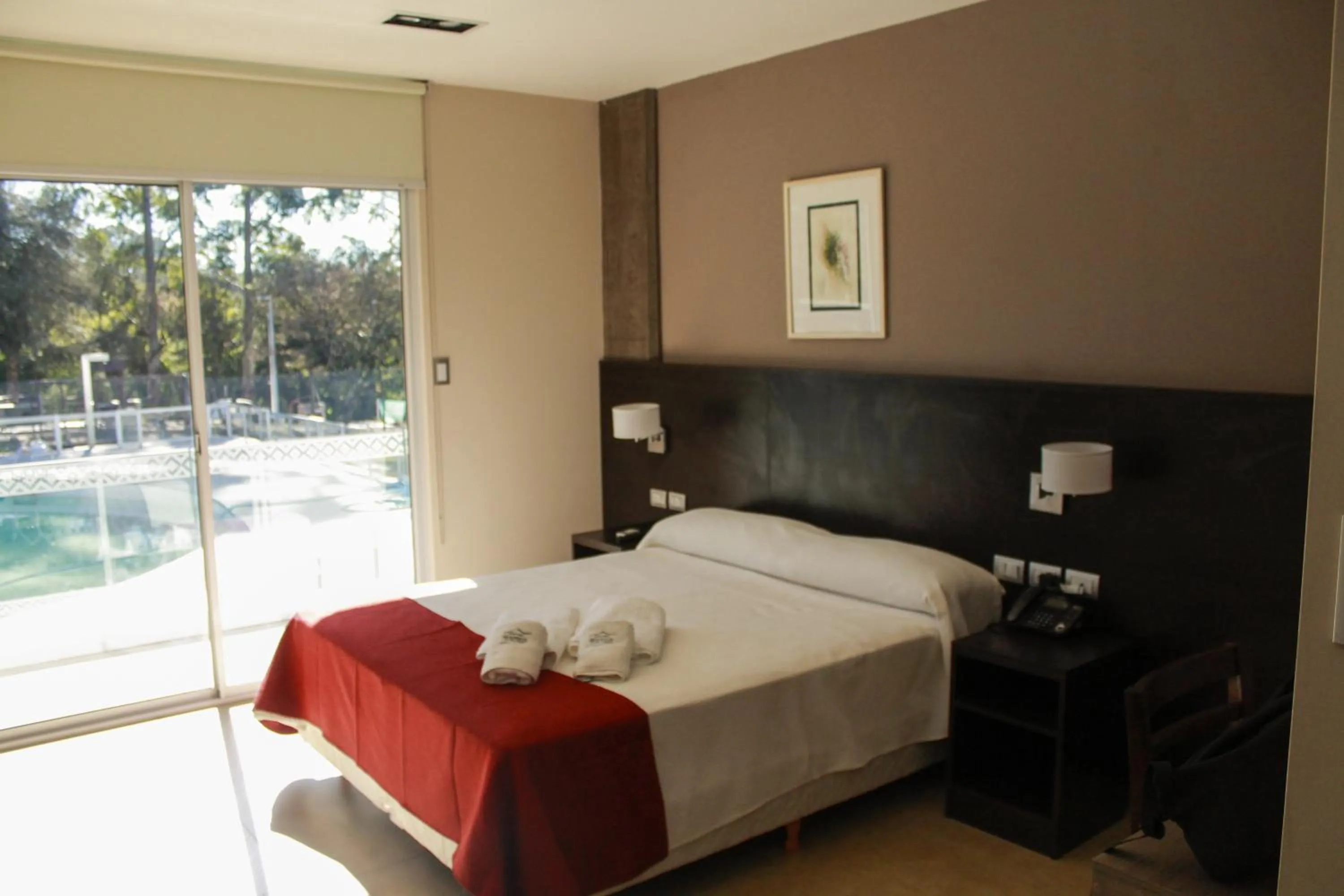 Bed in Hostería Atahualpa Yupanqui