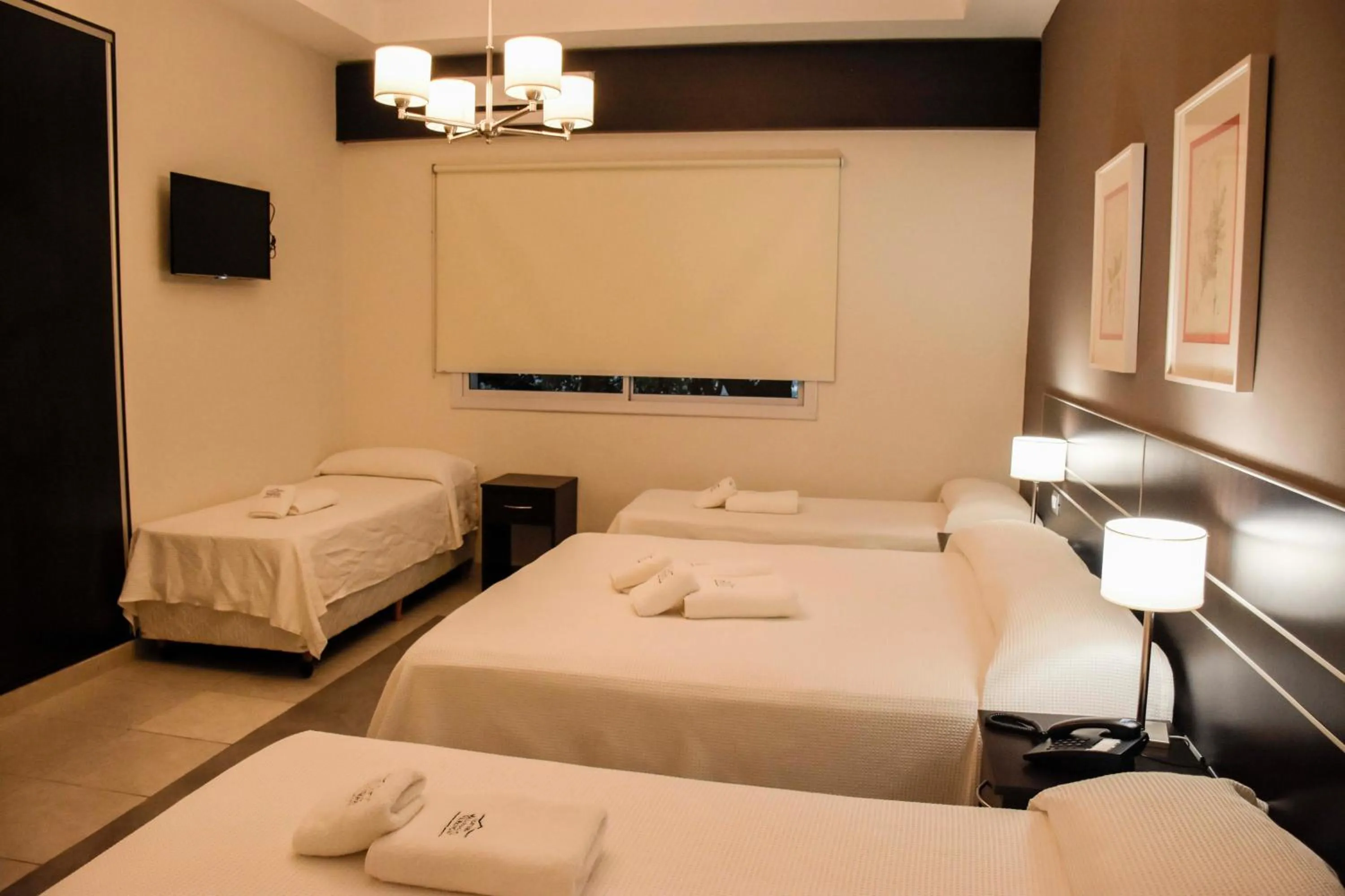 Bed in Hostería Atahualpa Yupanqui