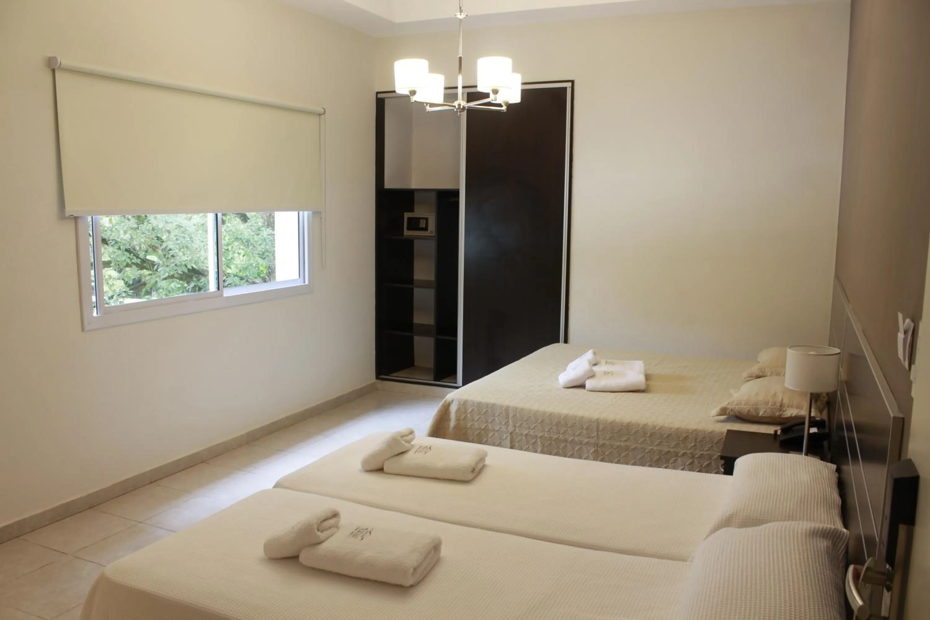 Bed in Hostería Atahualpa Yupanqui