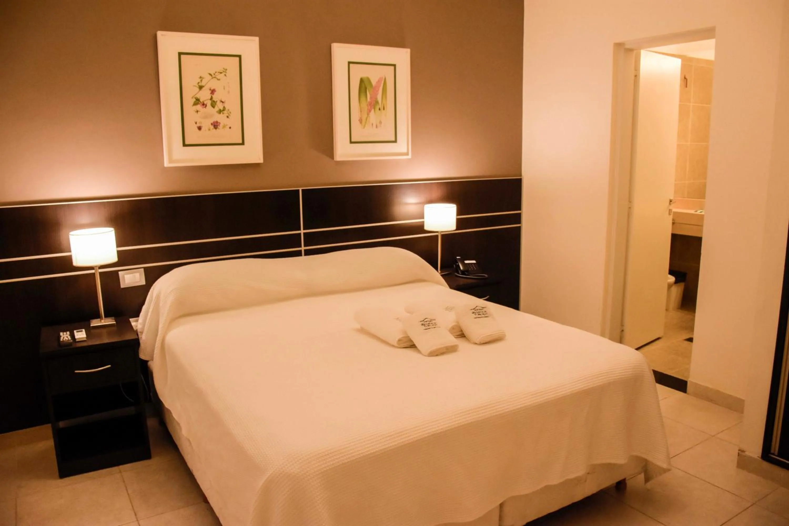 Bed in Hostería Atahualpa Yupanqui