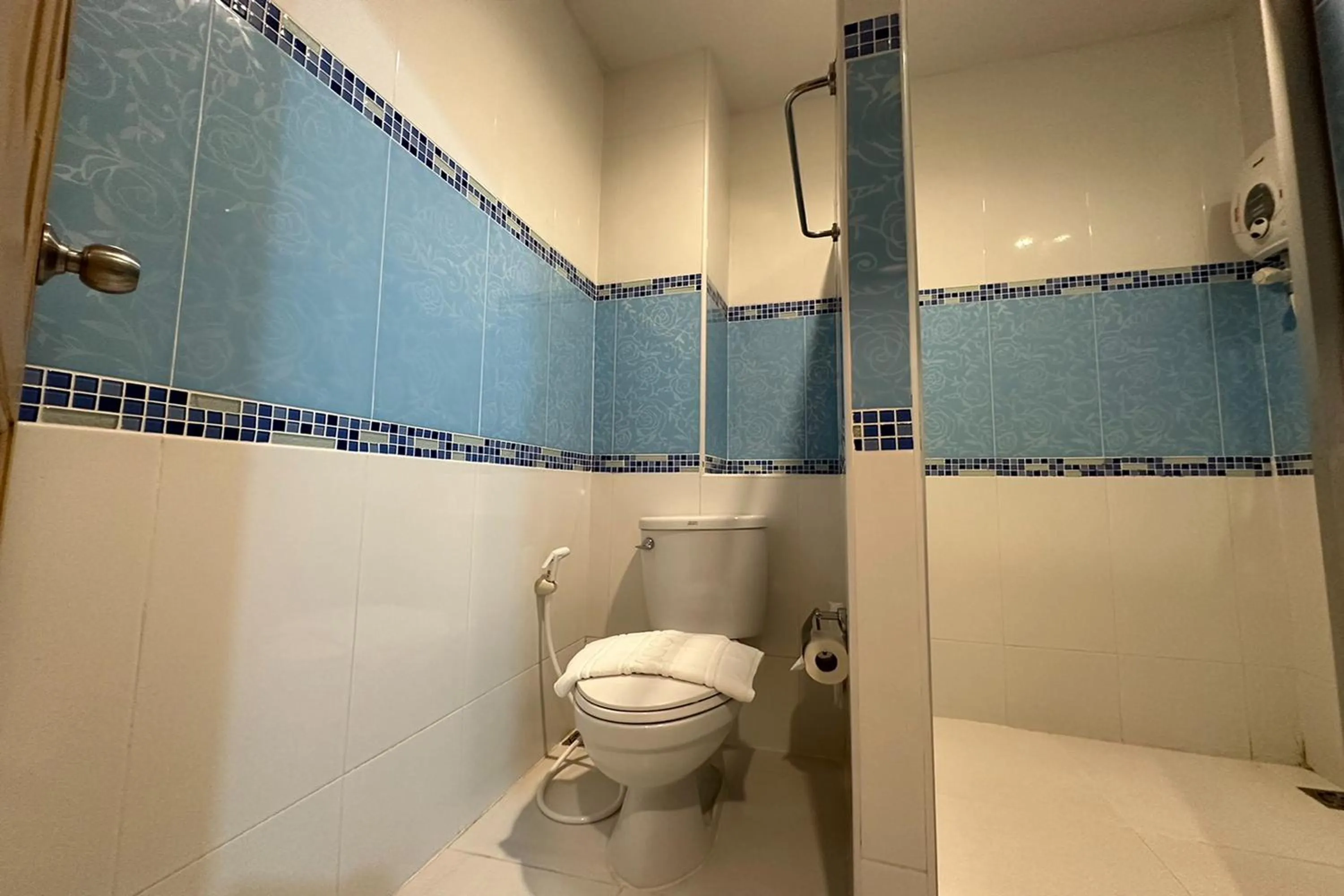 Bathroom in Chiangrai Grand Room Hotel