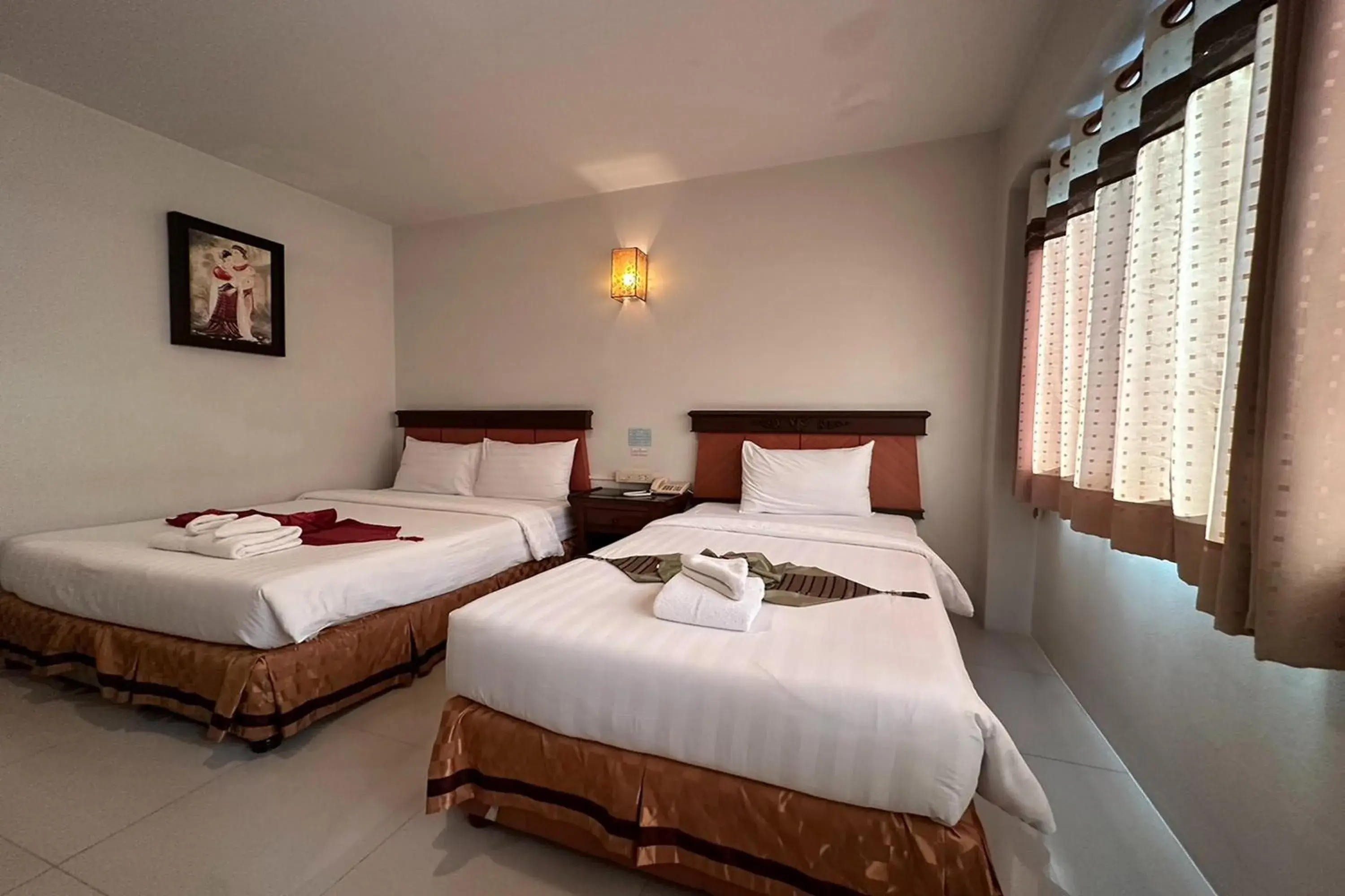 Superior Triple Room in Chiangrai Grand Room Hotel Superior Triple Room in Chiangrai Grand Room Hotel