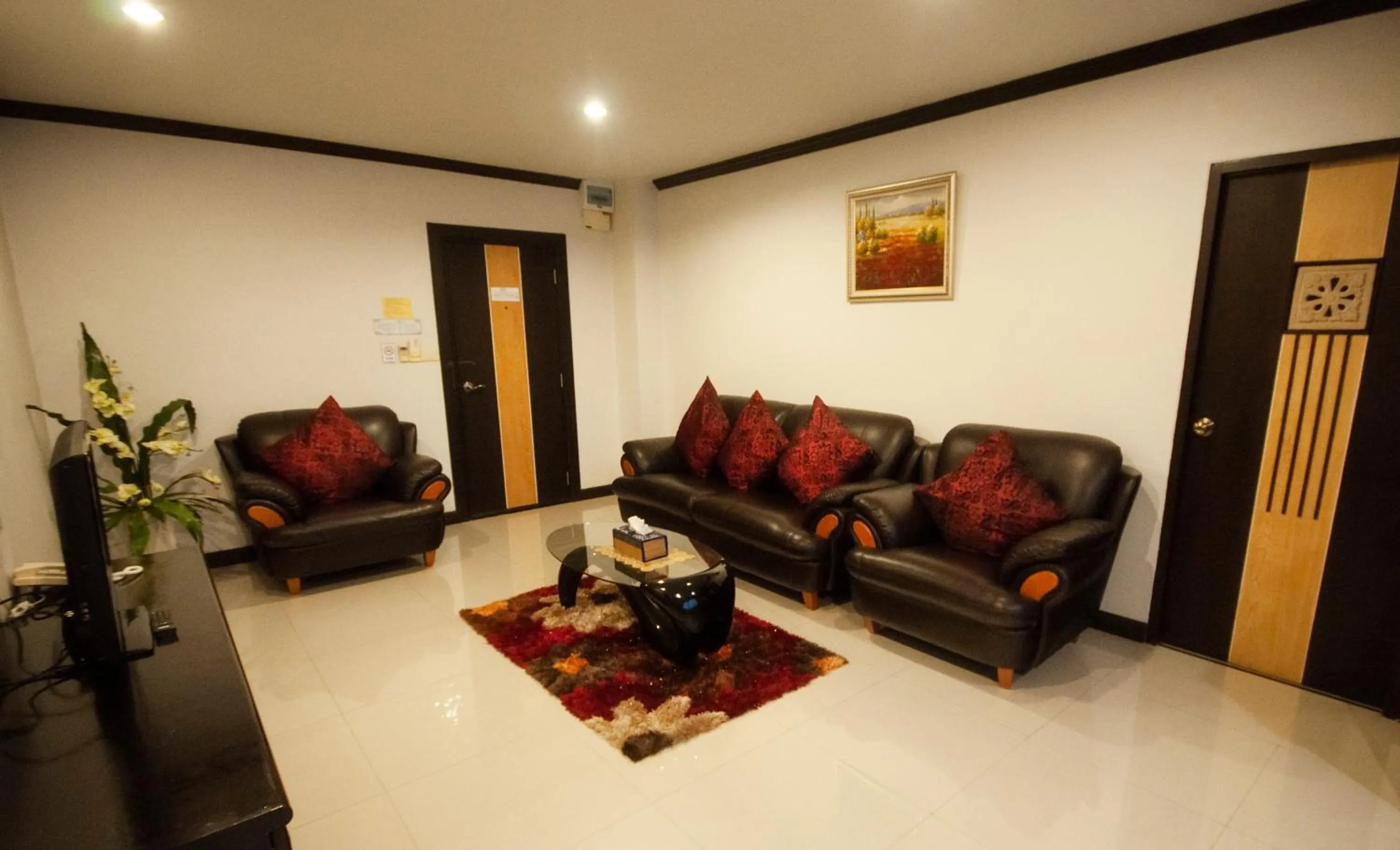 Seating area in Chiangrai Grand Room Hotel