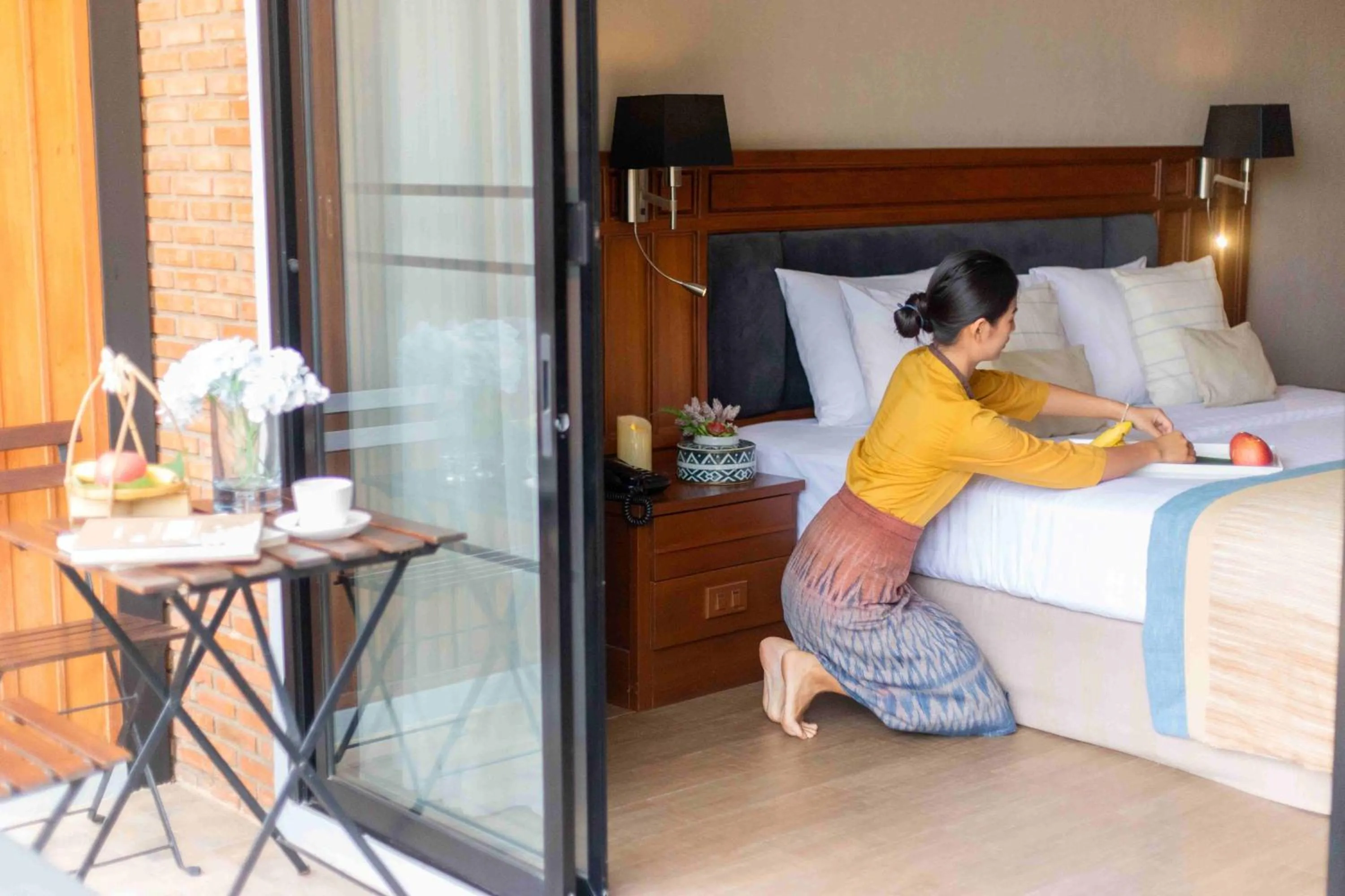 Bed in Tohsang Heritage Ubon Hotel