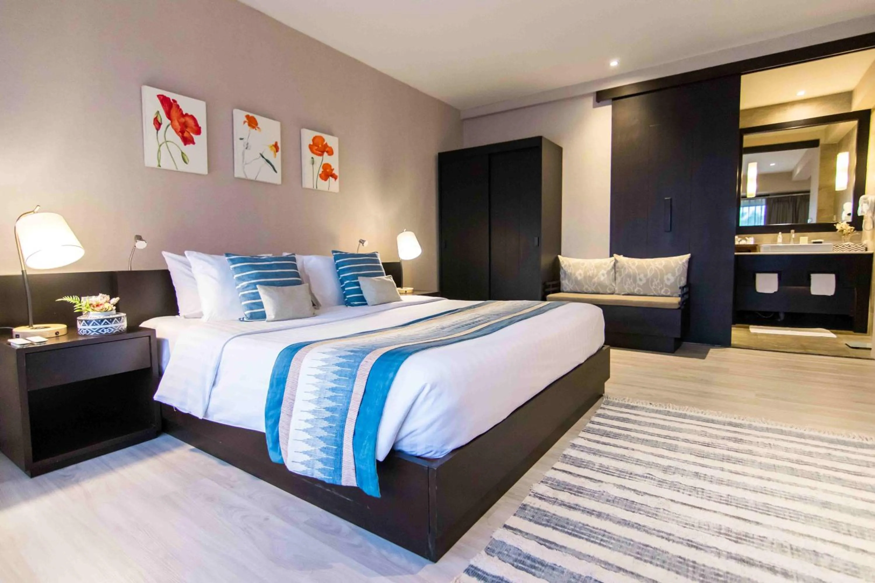 Bed in Tohsang Heritage Ubon Hotel