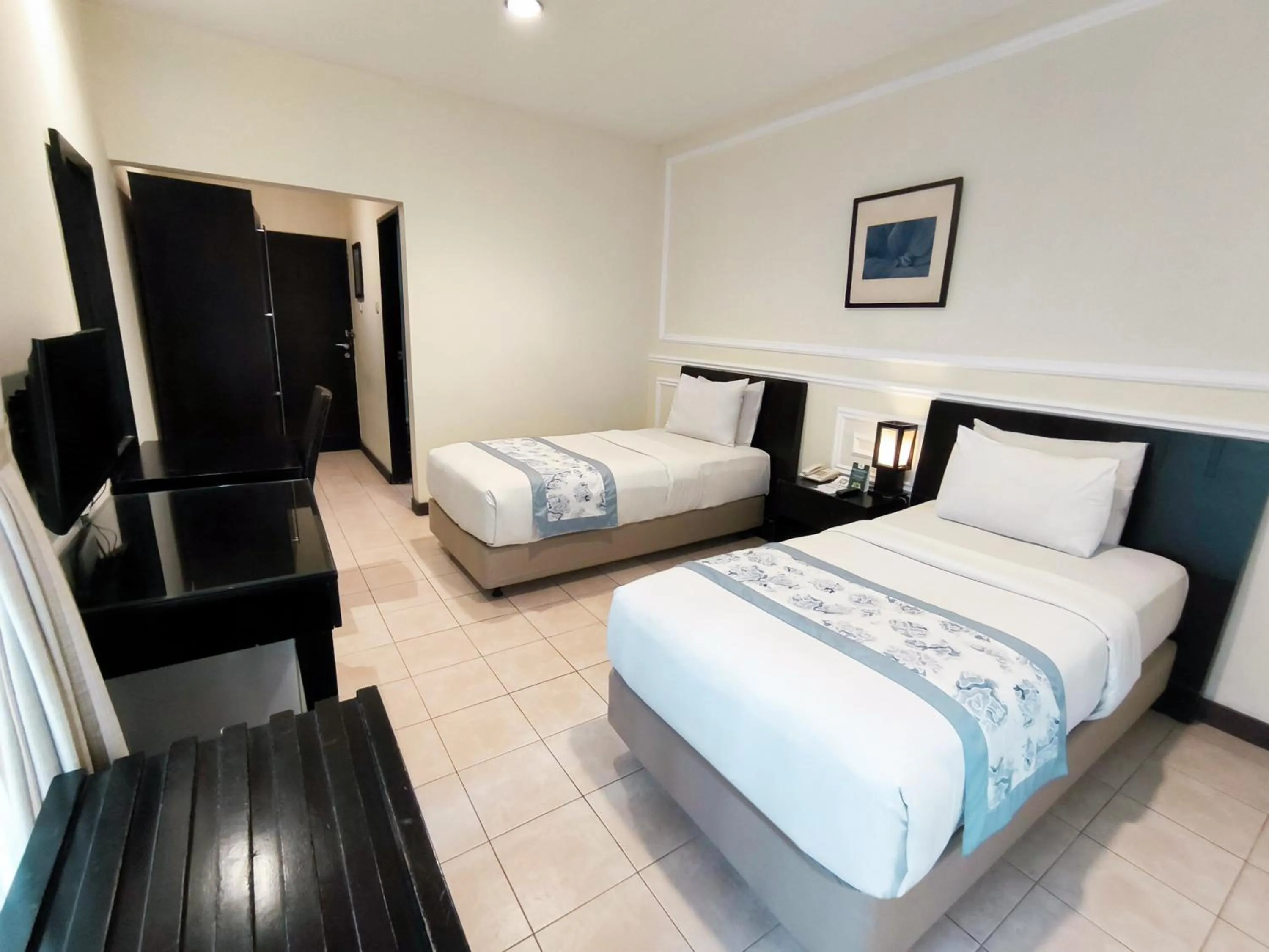 Bed in Puteri Gunung Hotel