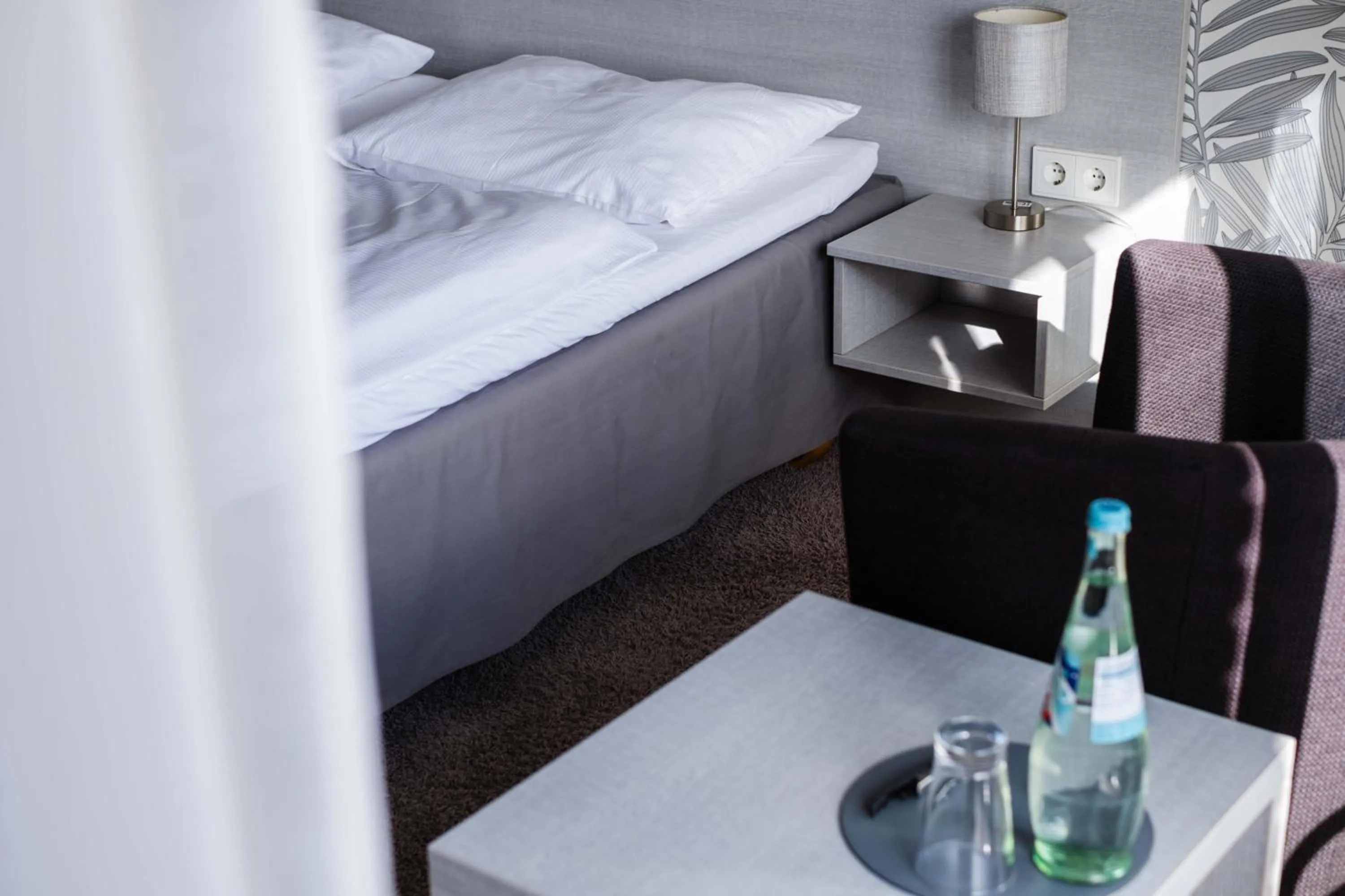 Photo of the whole room, Bed in Hotel des Nordens Flensburg Wellness & Spa