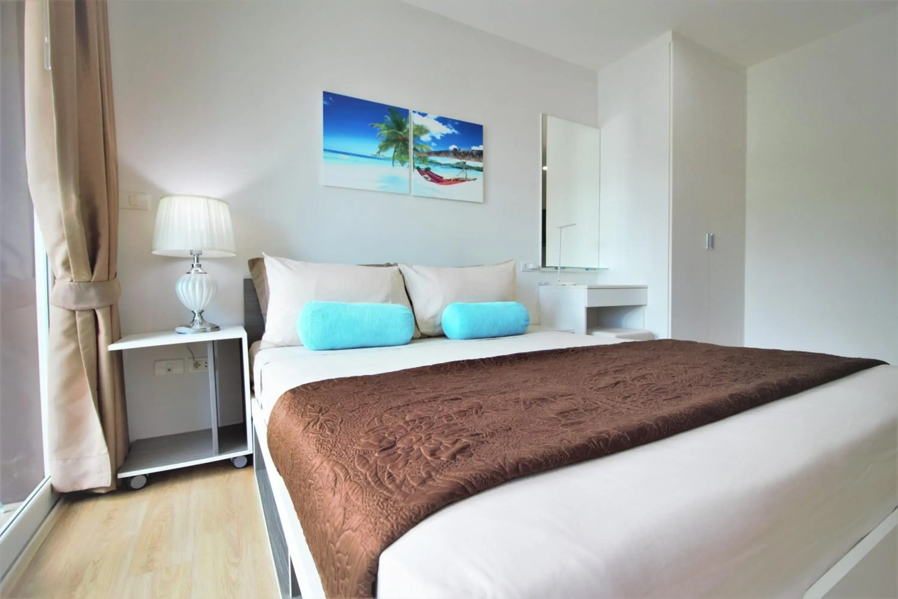 Photo of the whole room, Bed in Ozone Condotel Kata Beach by PHR Photo of the whole room, Bed in Ozone Condotel Kata Beach by PHR