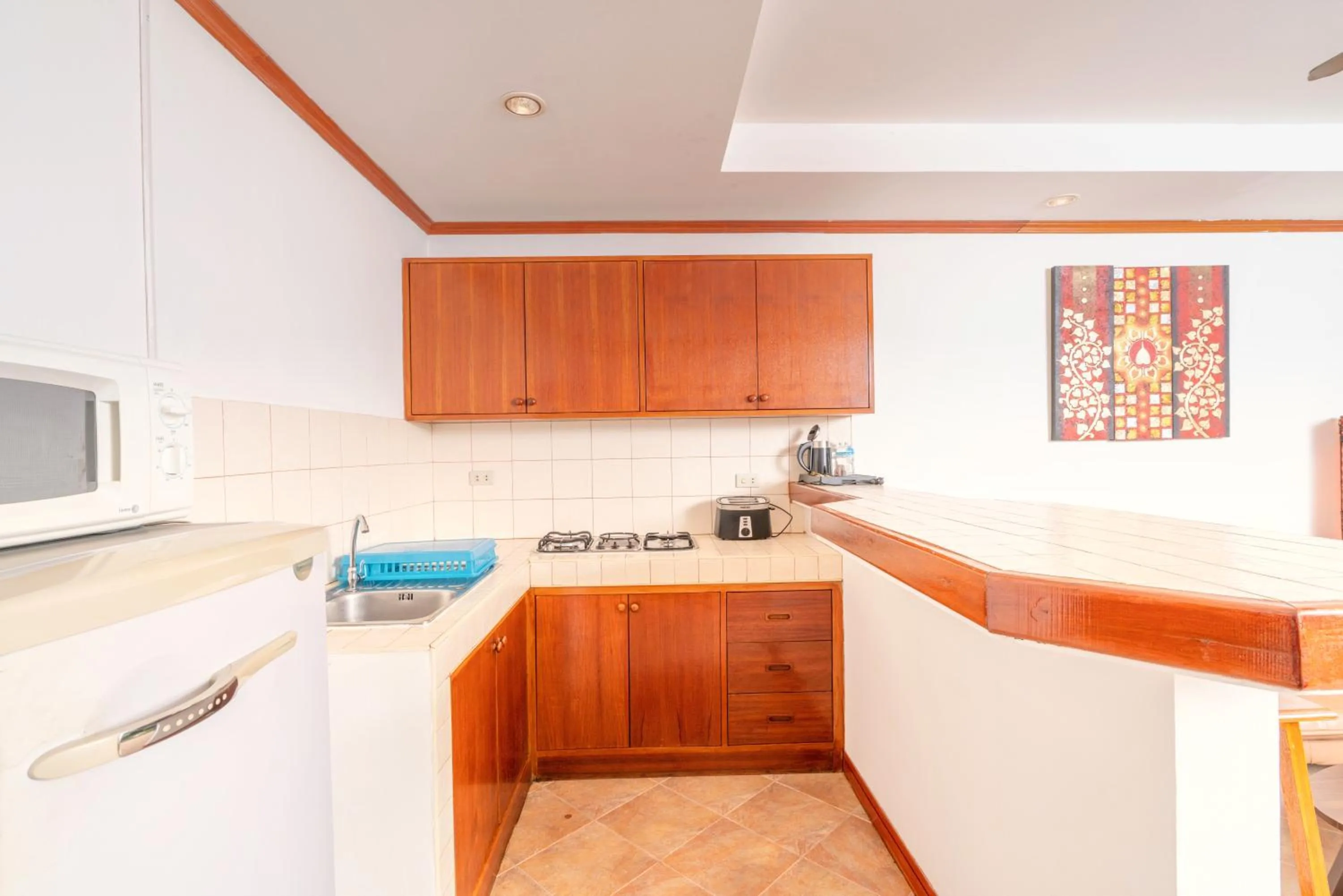 kitchen in Sai Rougn Residence - SHA Extra Plus