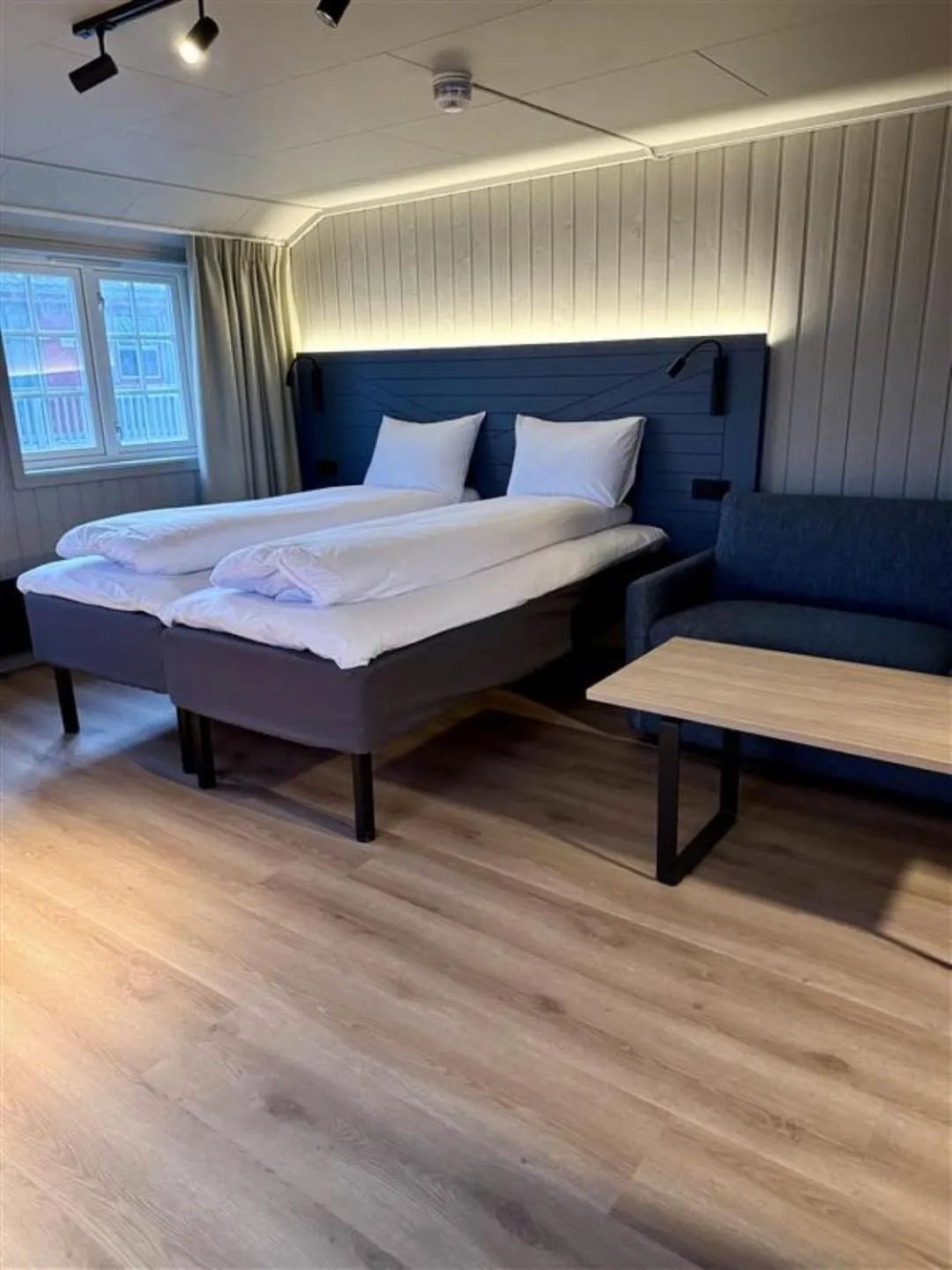 Bed in Grønnbuene Rorbu Hotel