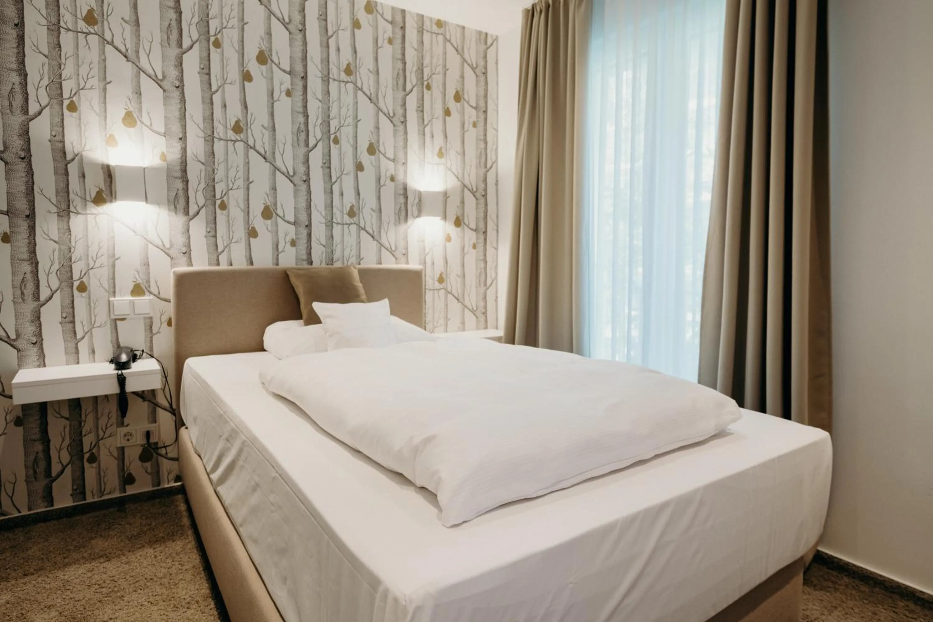 Bed in Hotel Crystal