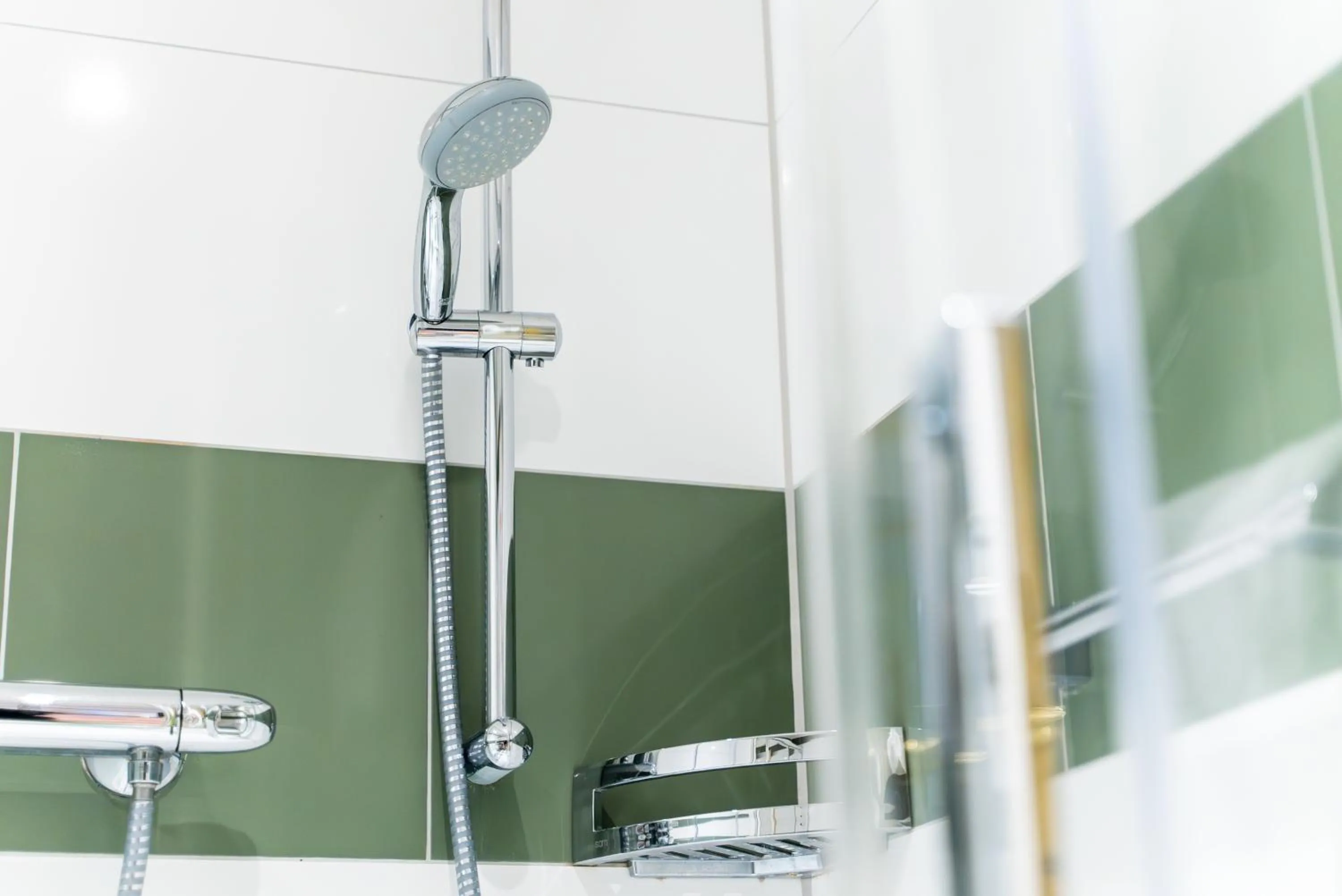 Shower in Hotel Appartement Landhaus Stutzi - Hotel Strandperle