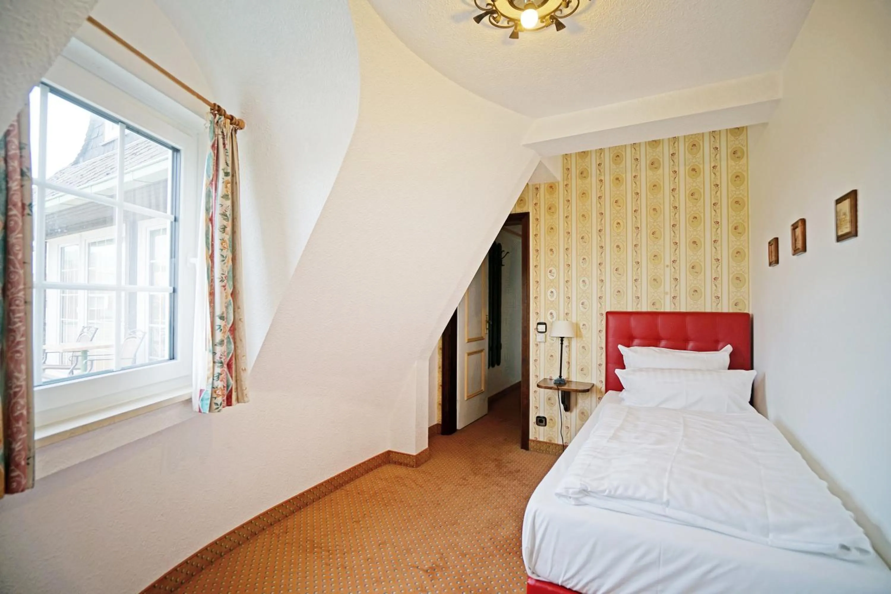 Bedroom, Bed in Hotel Appartement Landhaus Stutzi - Hotel Strandperle