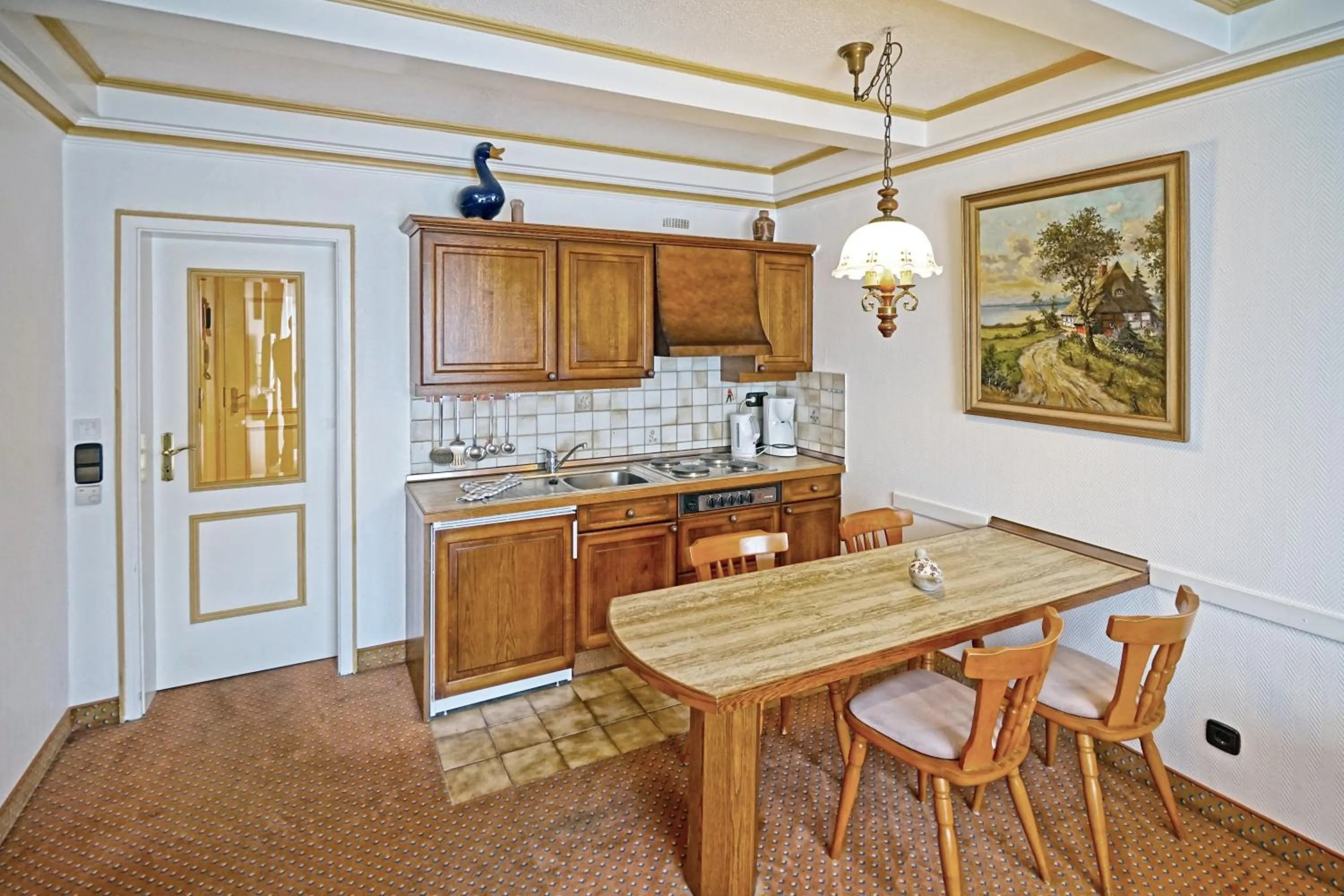 kitchen in Hotel Appartement Landhaus Stutzi - Hotel Strandperle