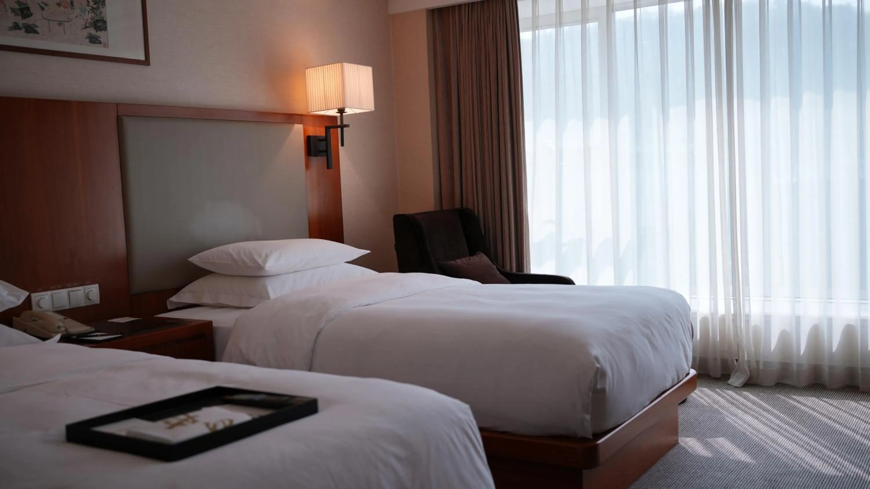 Bed in Zhejiang Narada Grand Hotel