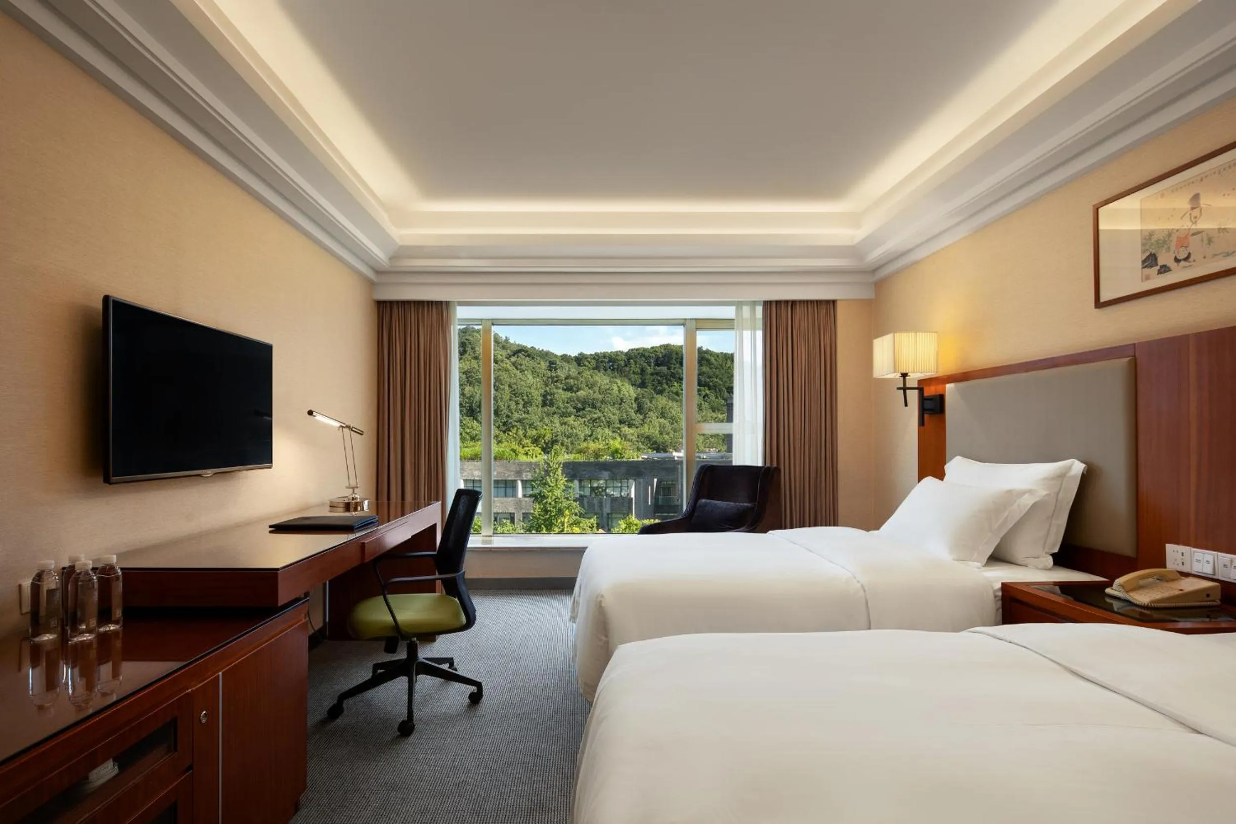 Bed in Zhejiang Narada Grand Hotel