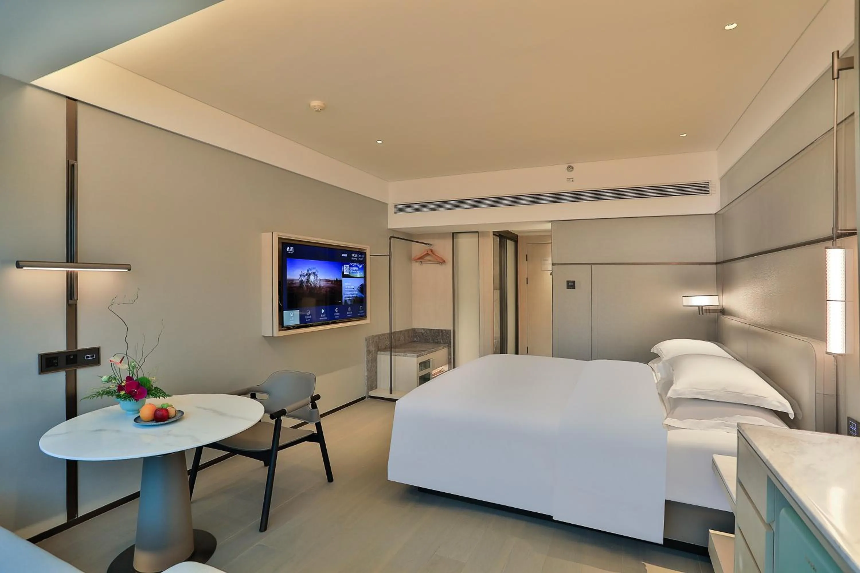 Bed in Zhejiang Narada Grand Hotel