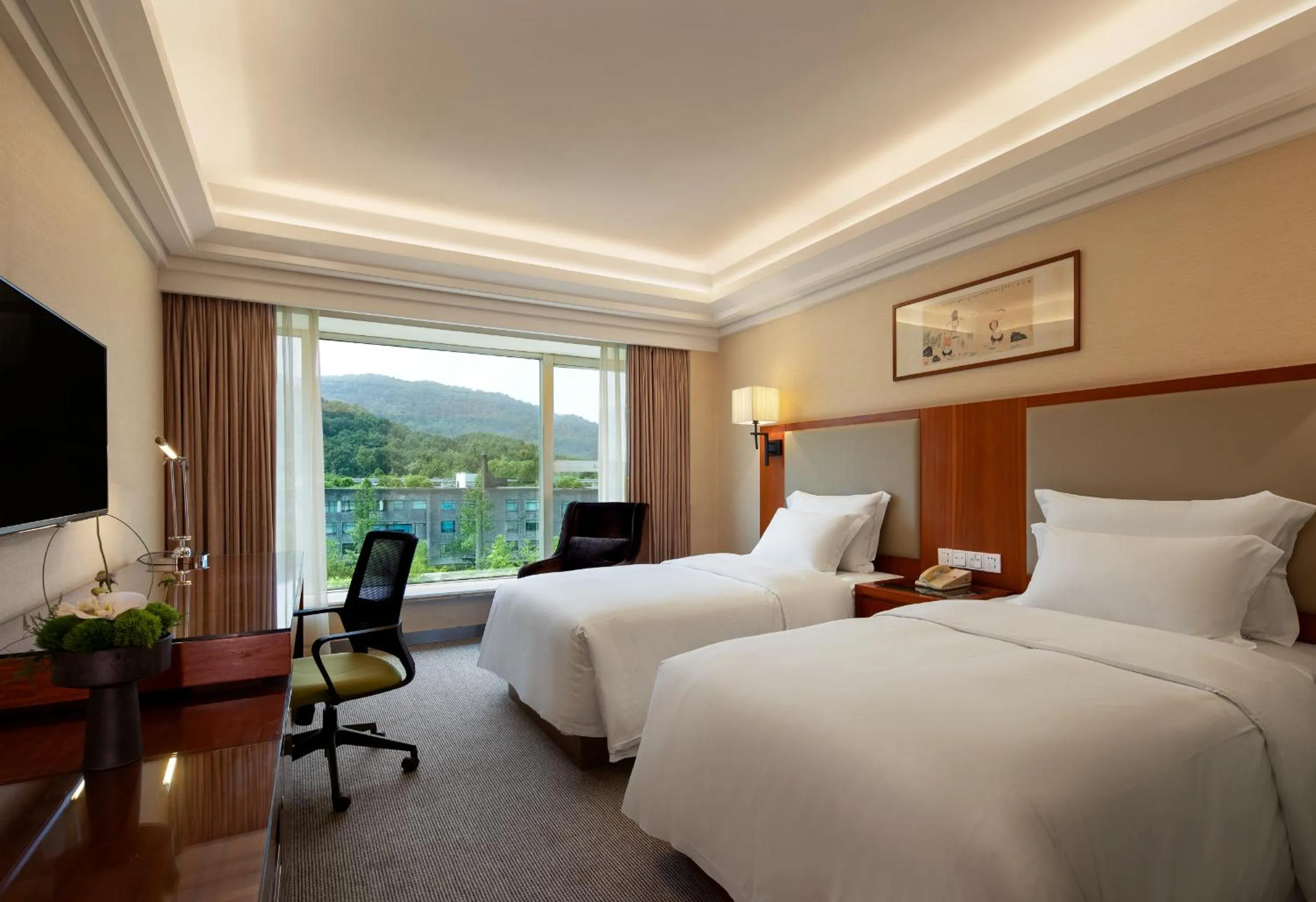Bed in Zhejiang Narada Grand Hotel