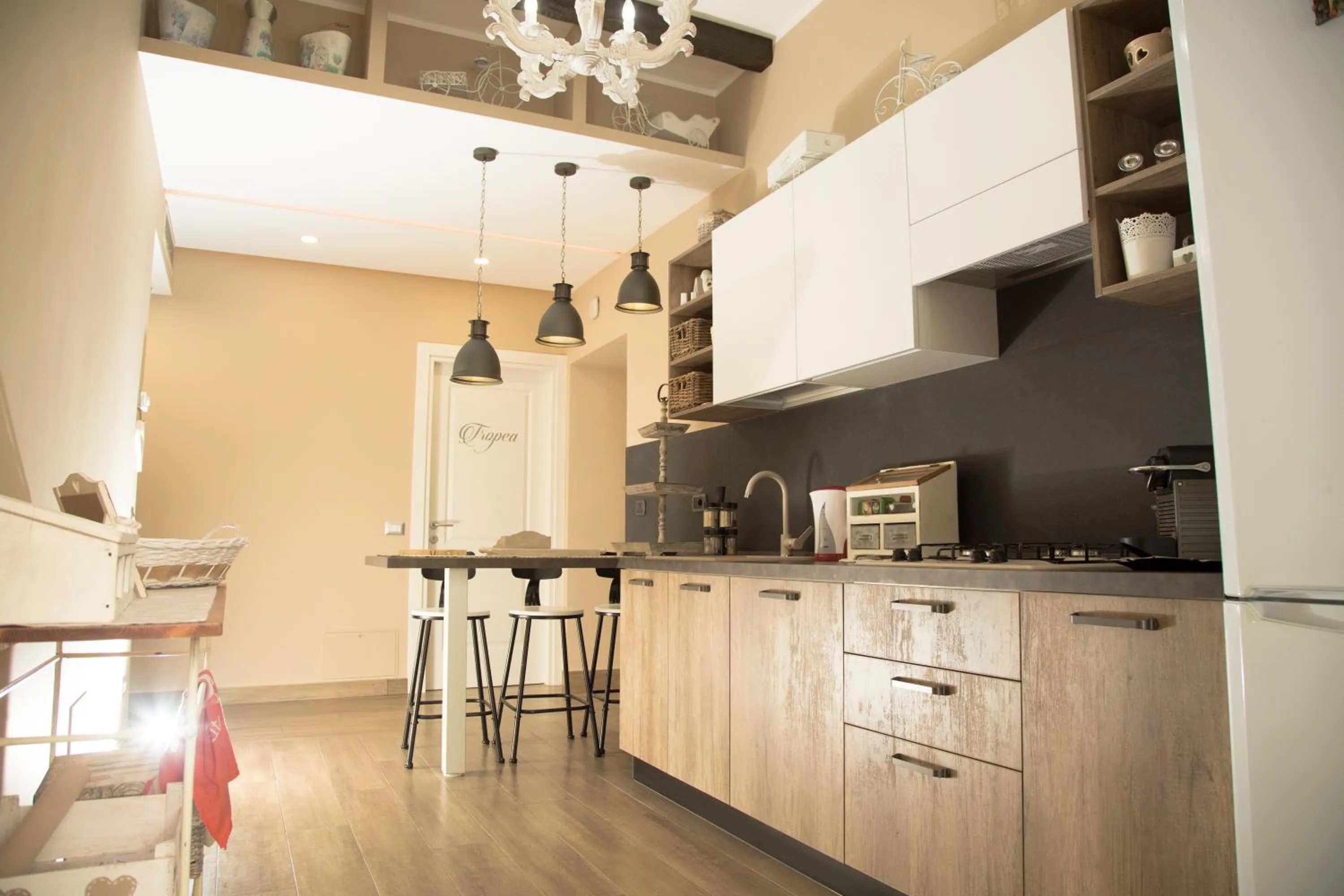 Communal lounge/ TV room in Relais Villa Italia