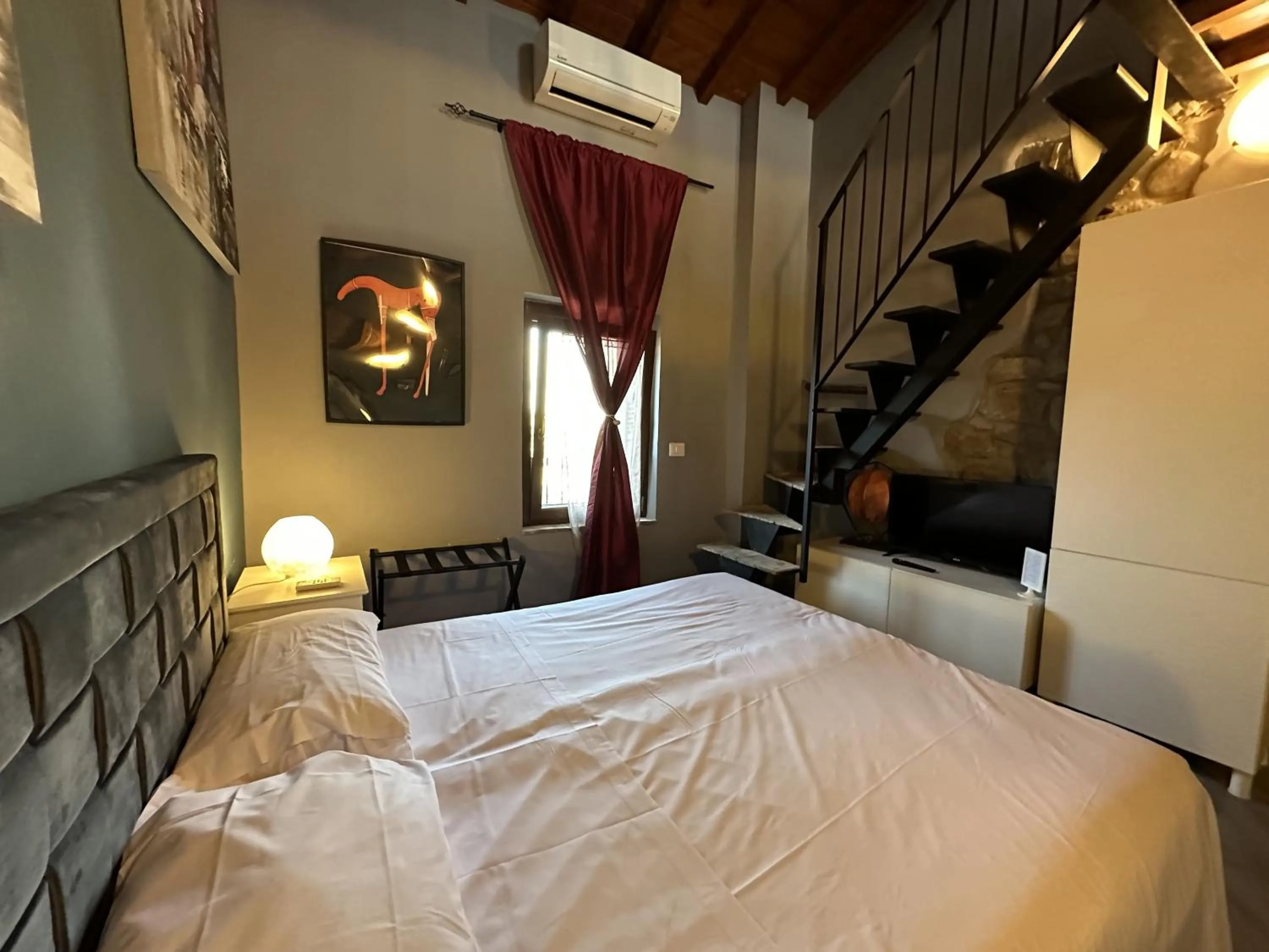 Photo of the whole room, Bed in Al Cardinale