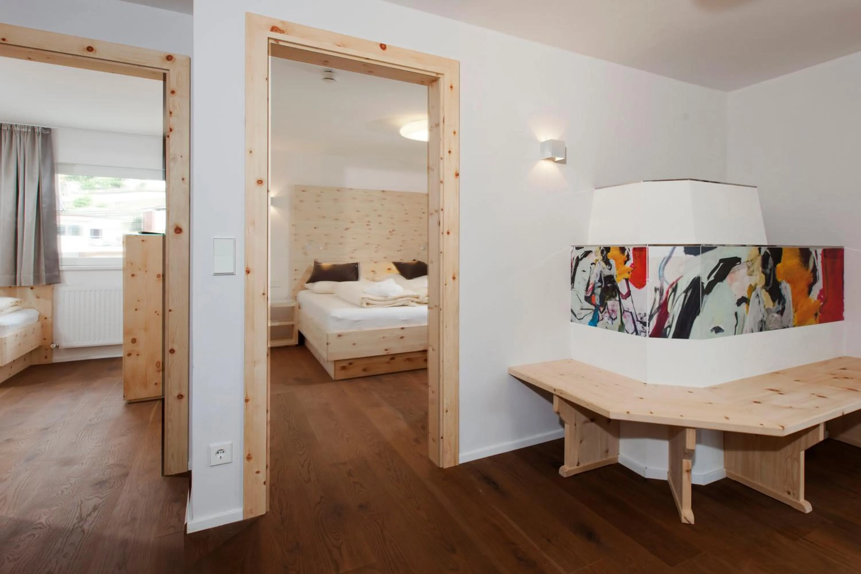 Living room, Bed in Alpin Art & Spa Hotel Naudererhof Superior