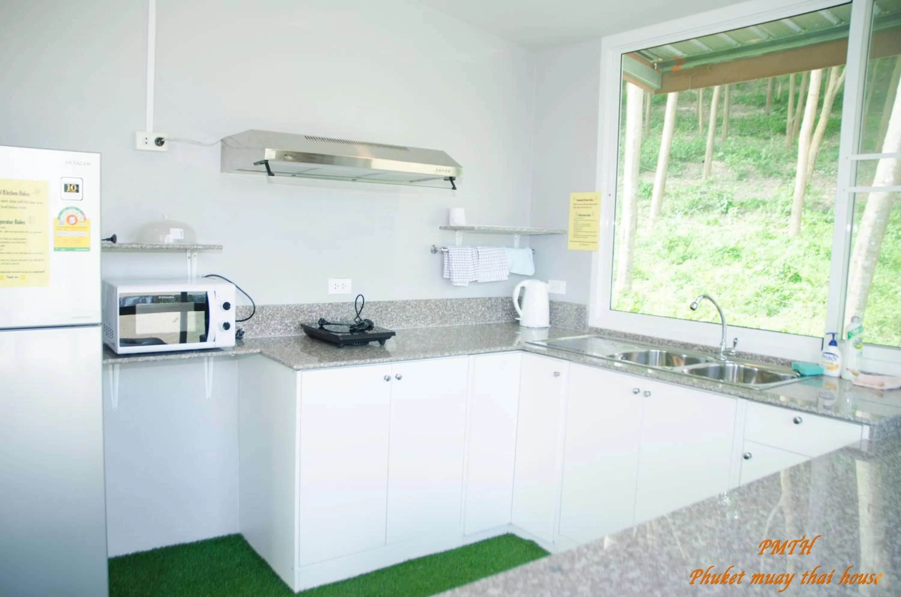 Communal kitchen in Phuket Muay Thai House