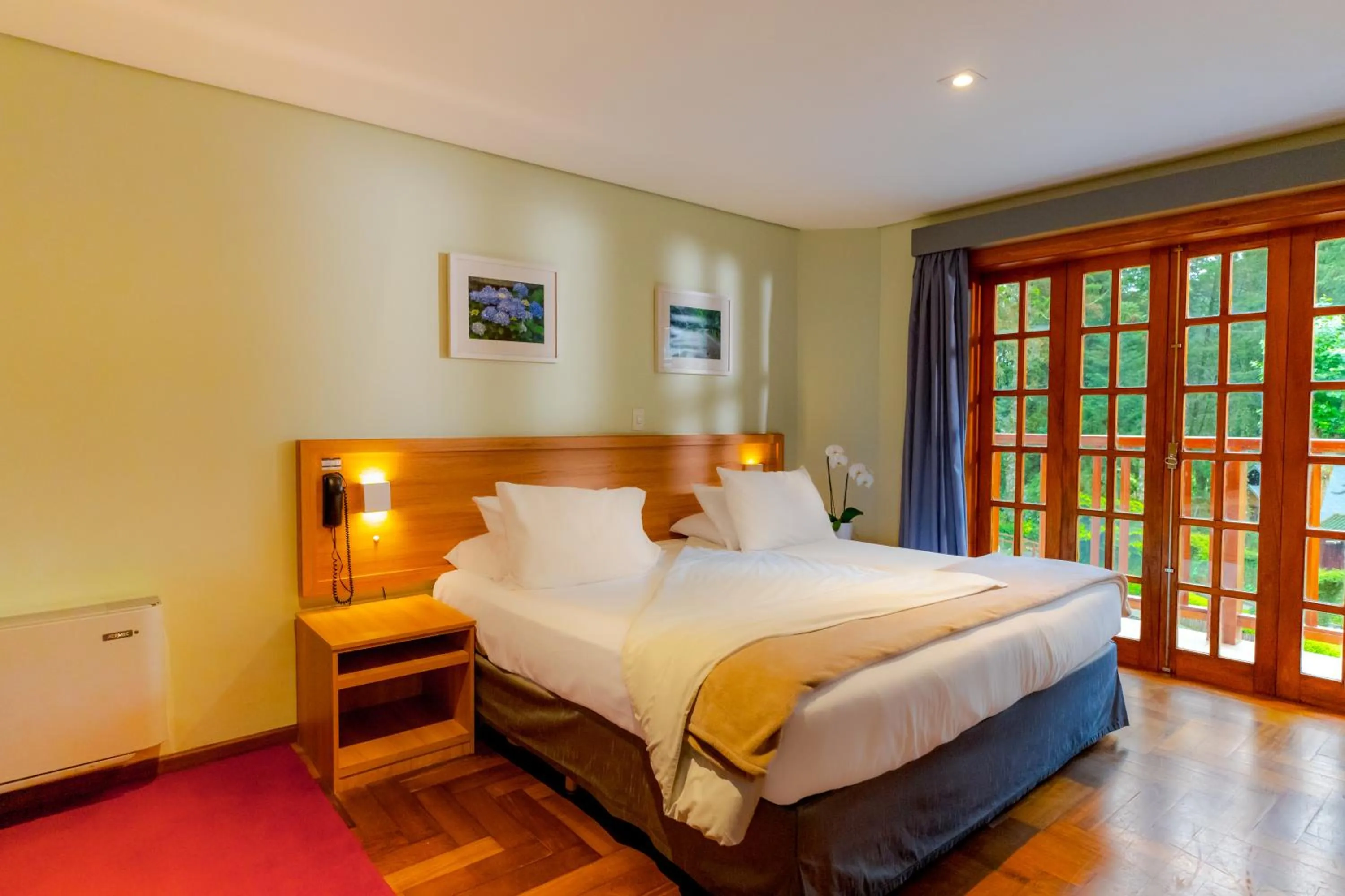 Bed in Pousada Campos dos Holandeses - Campos do Jordao