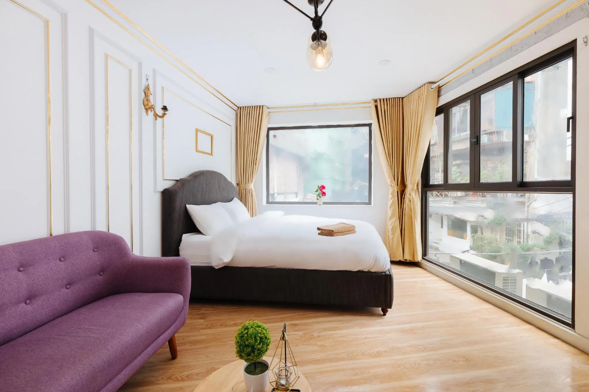 Bed in SaziHome Le Thanh Tong Hanoi