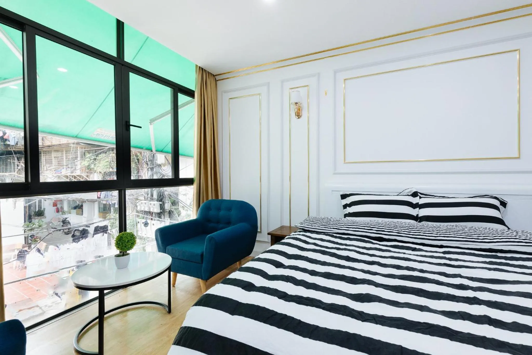 Bed in SaziHome Le Thanh Tong Hanoi