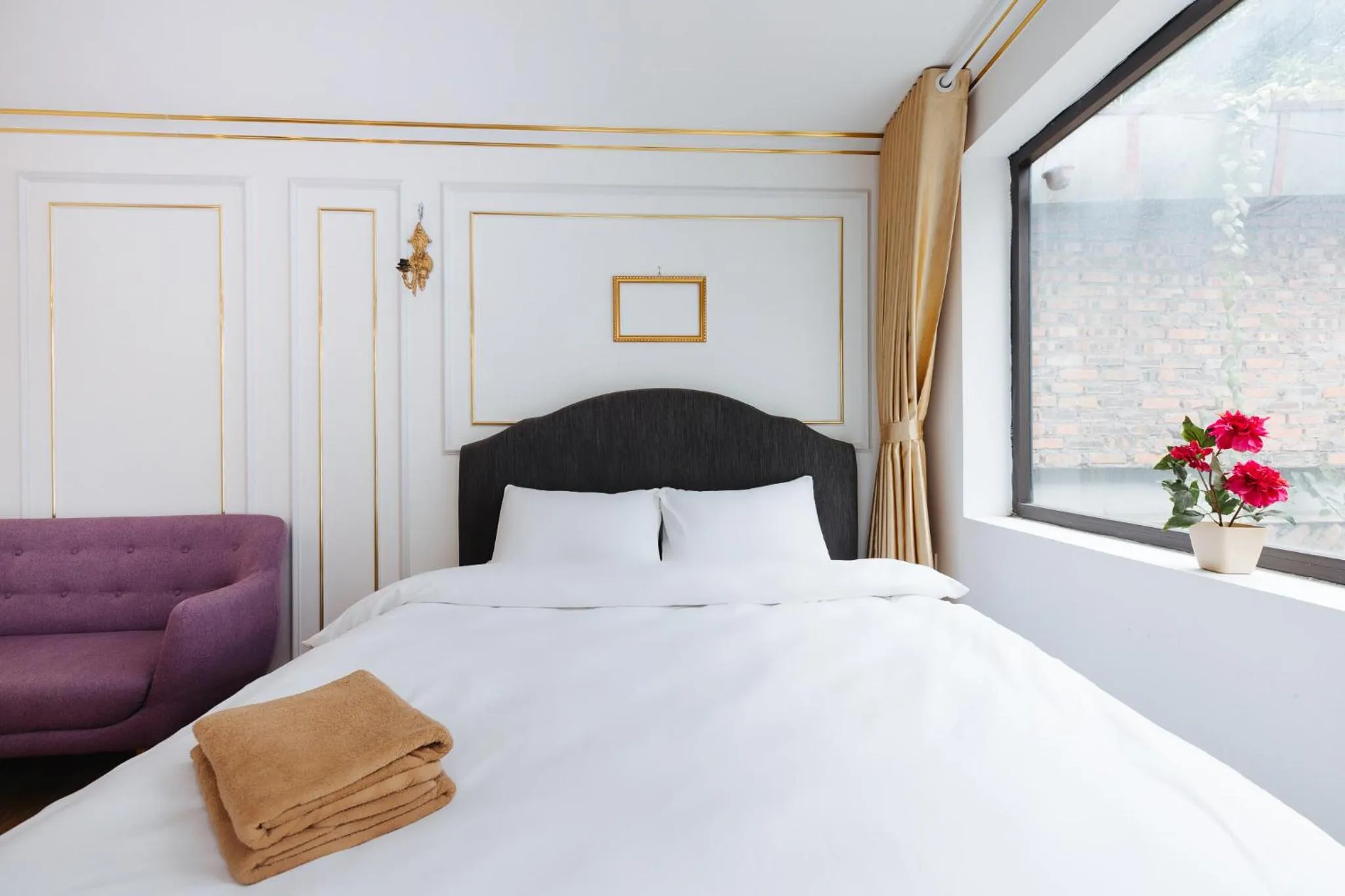 Bed in SaziHome Le Thanh Tong Hanoi