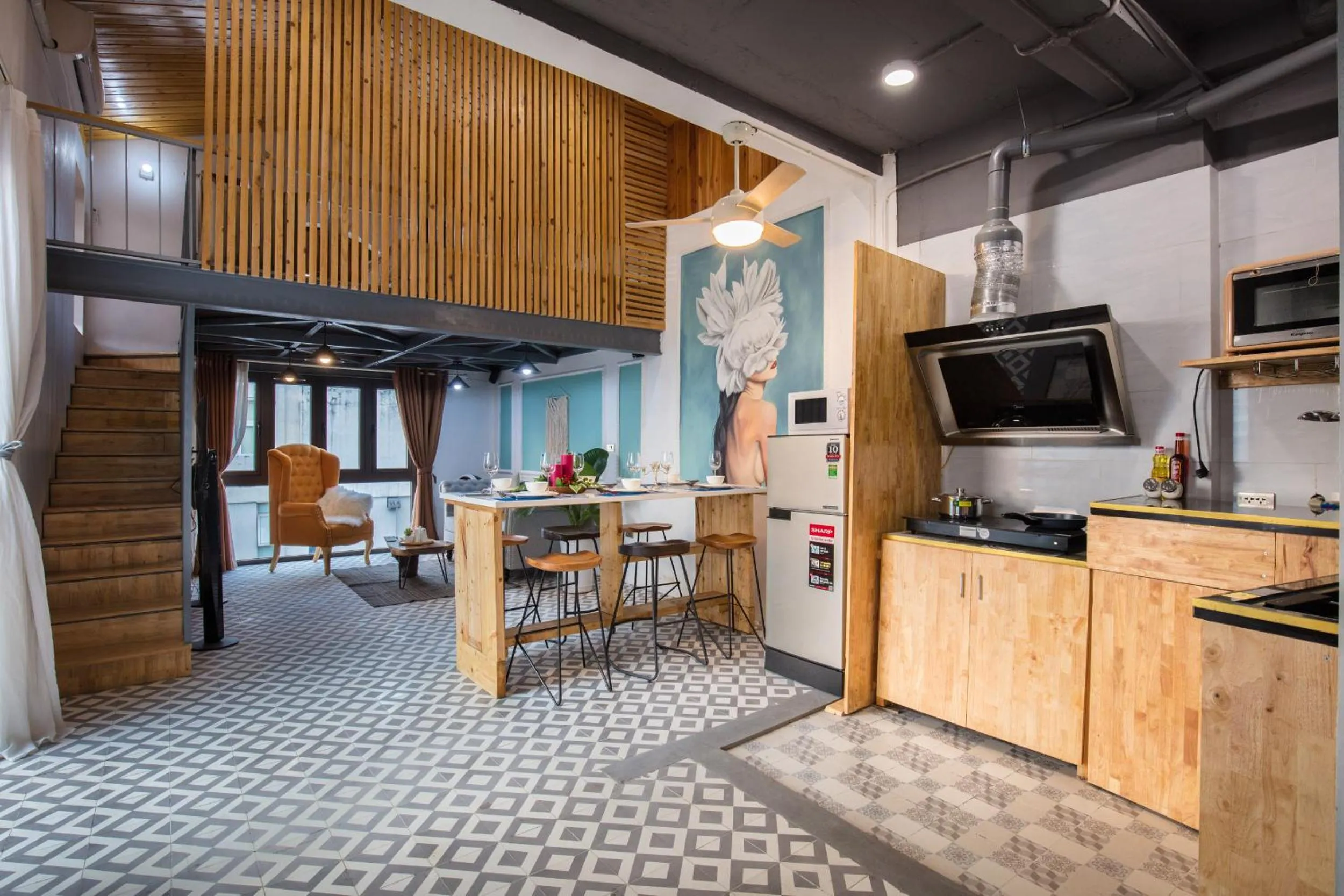 Communal lounge/ TV room in SaziHome Le Thanh Tong Hanoi