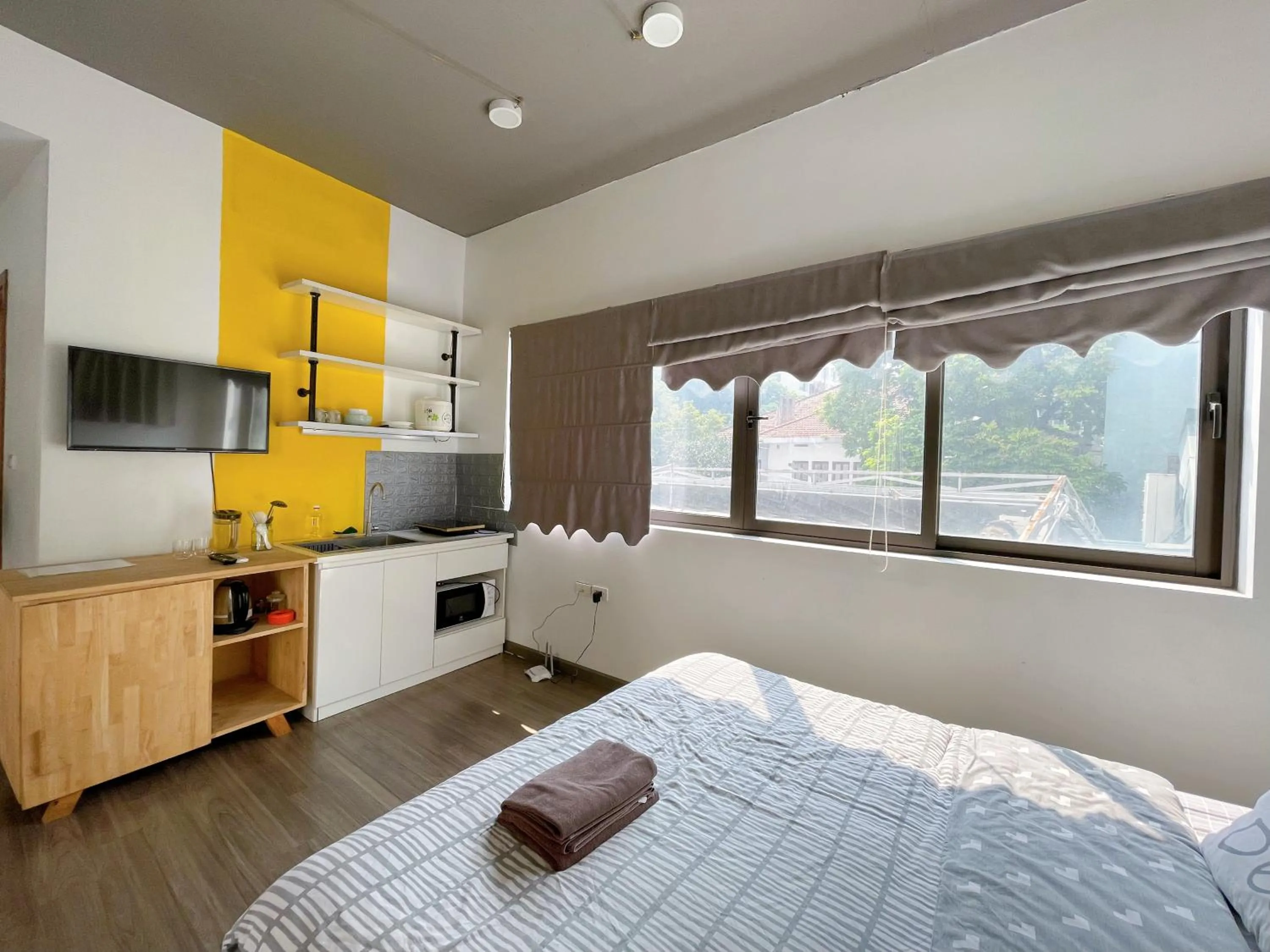 Photo of the whole room, Bed in SaziHome Le Thanh Tong Hanoi