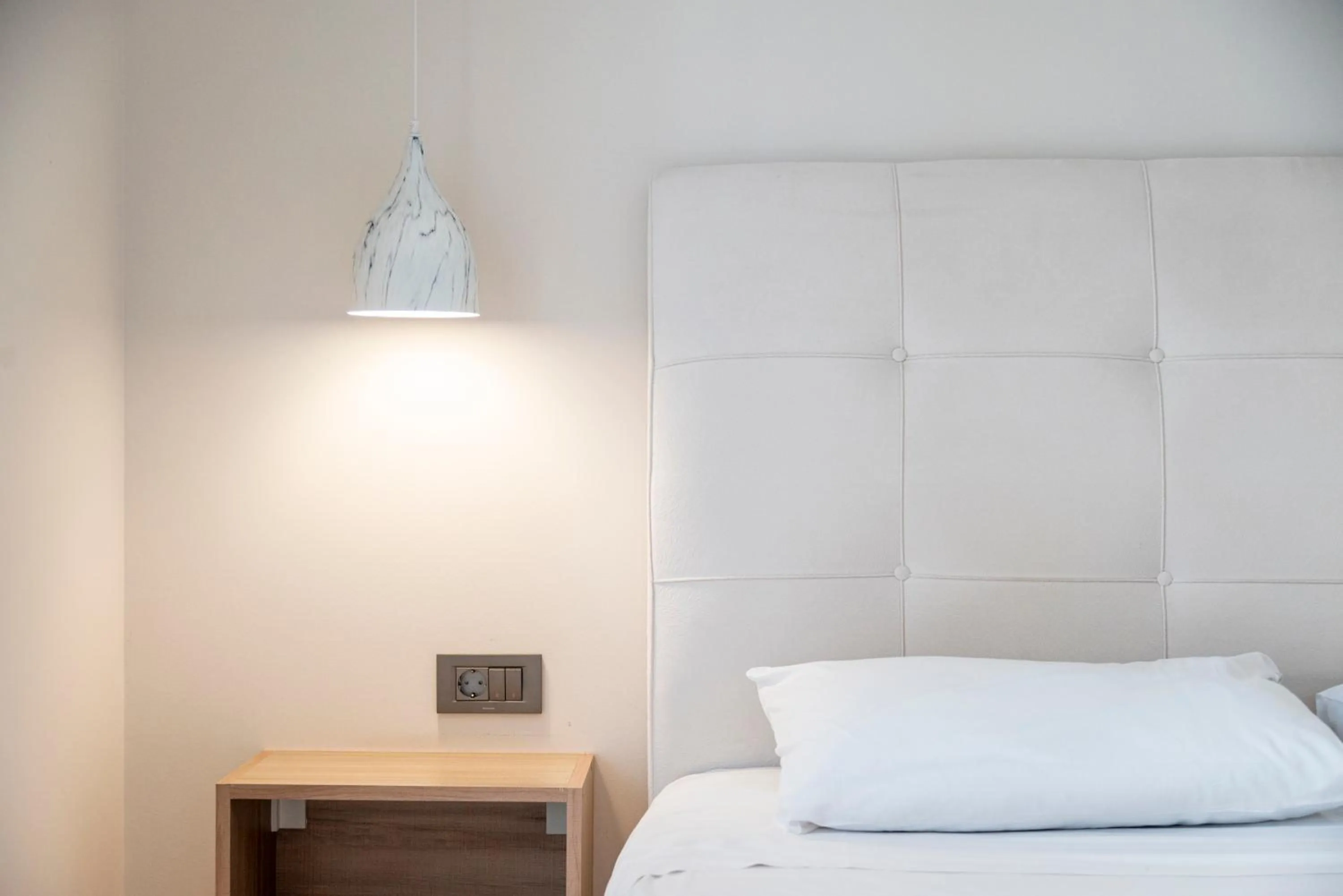 Bed in Sonia Hotel & Suites - Adults Only