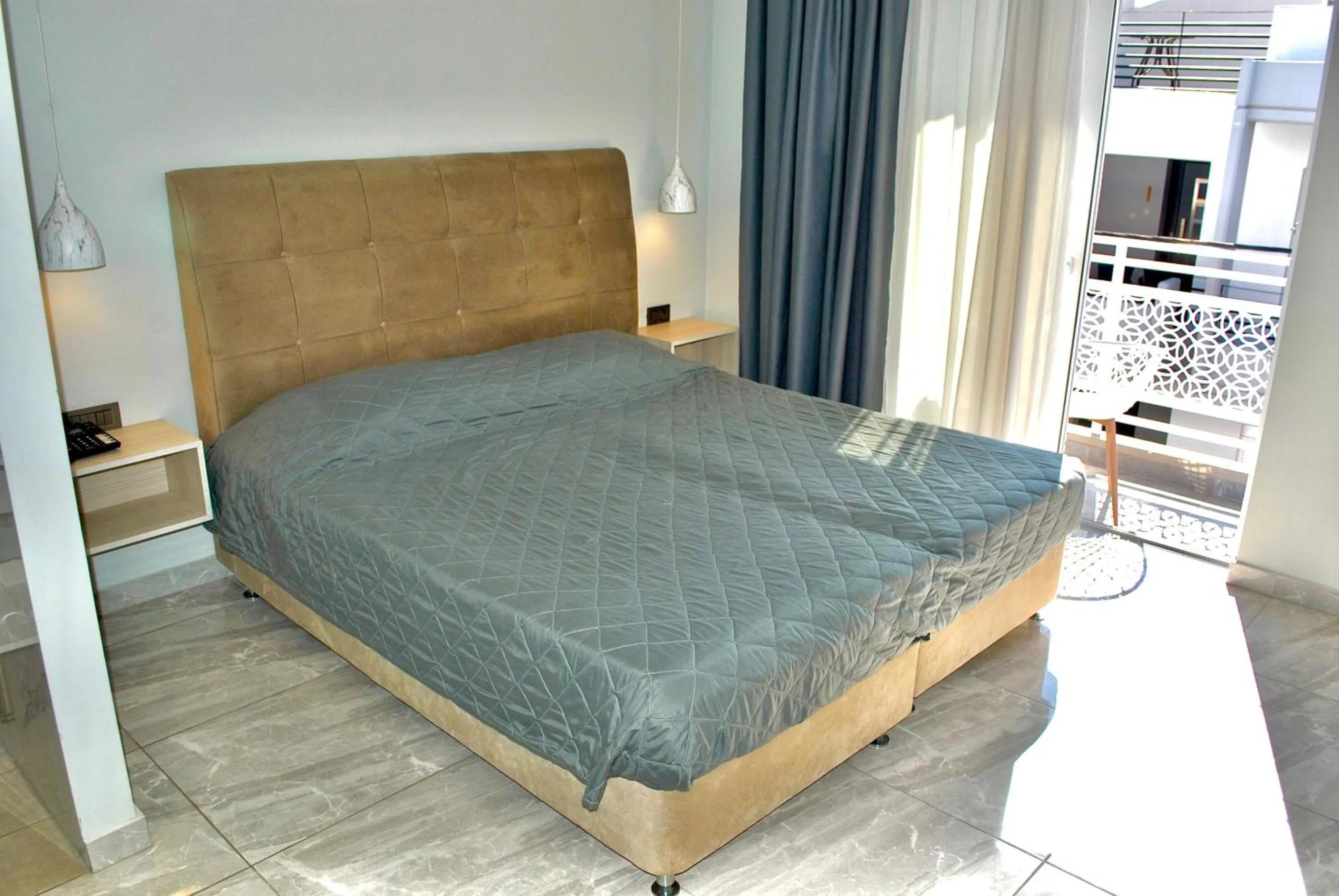 Bed in Sonia Hotel & Suites - Adults Only