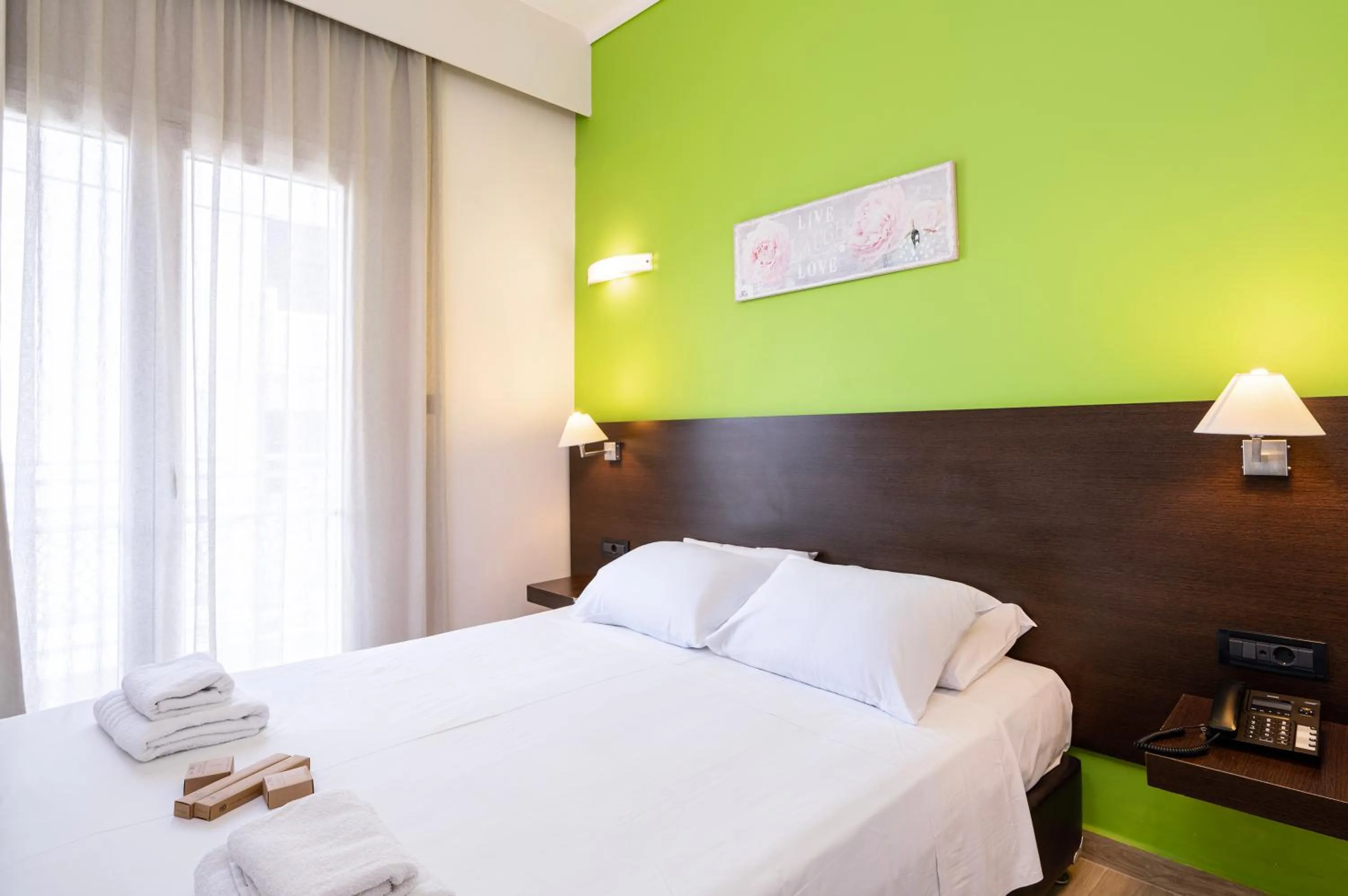 Bed in Sonia Hotel & Suites - Adults Only