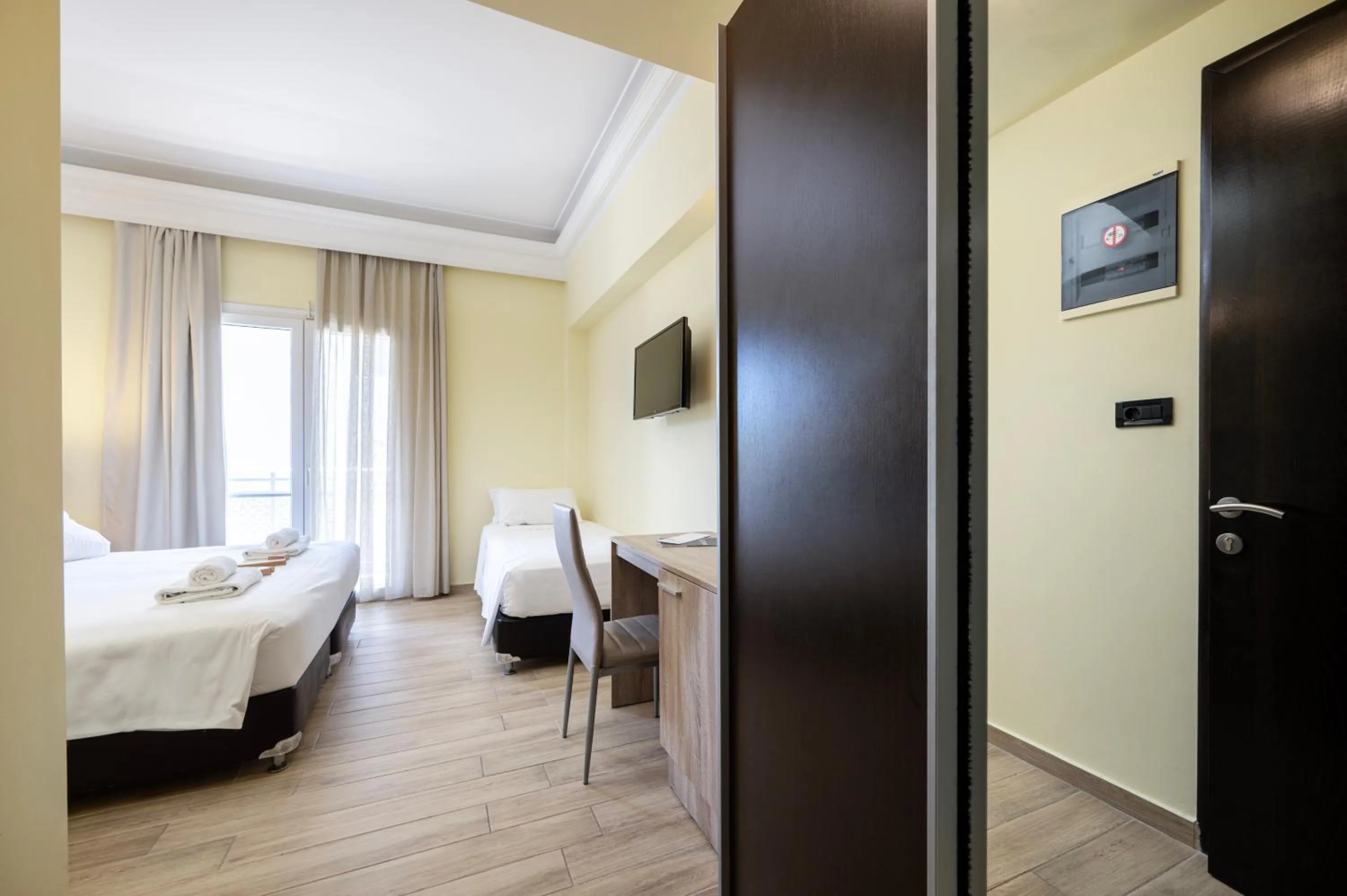 Bed in Sonia Hotel & Suites - Adults Only