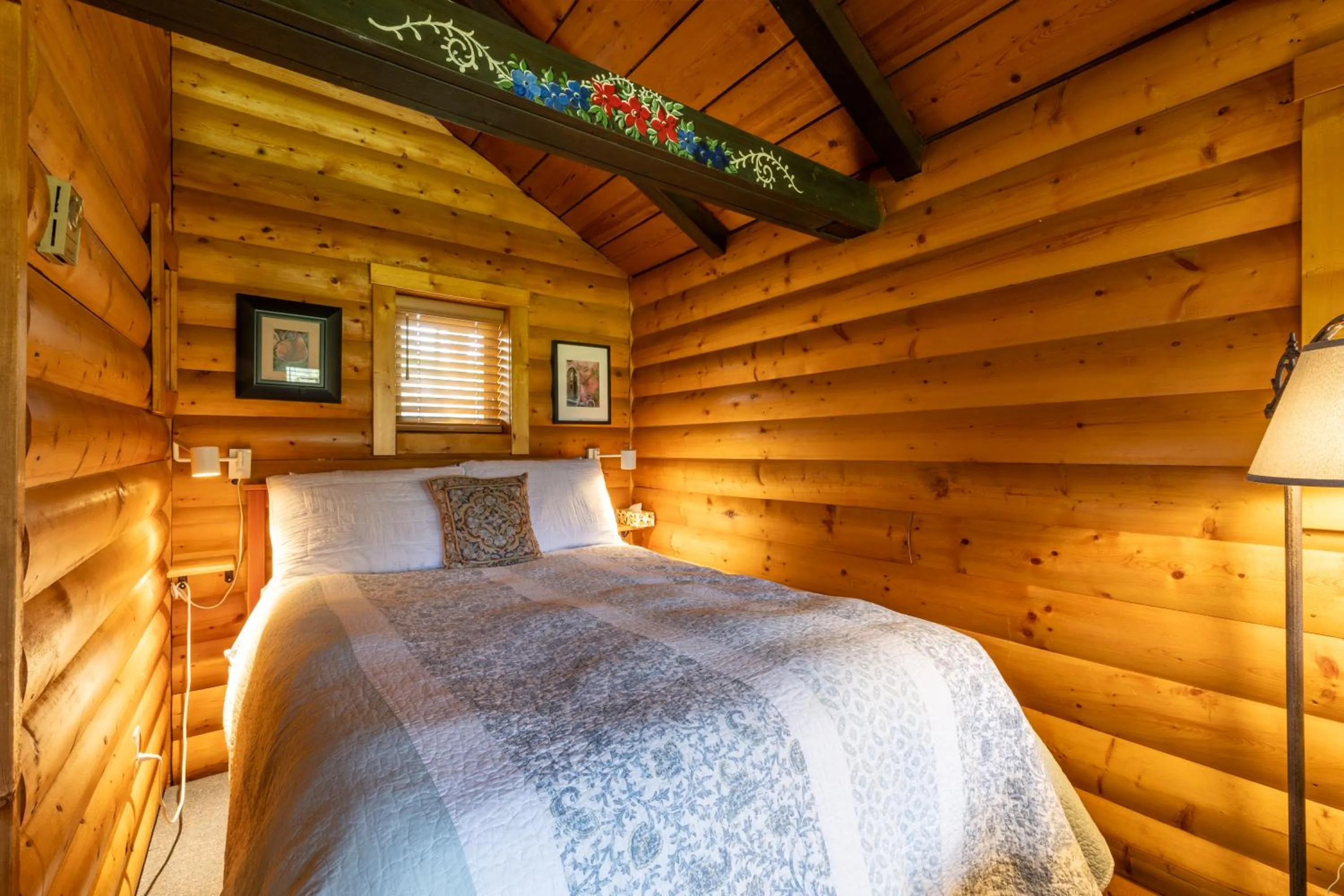 Bed in Rocky Mountain Cabins and Home
