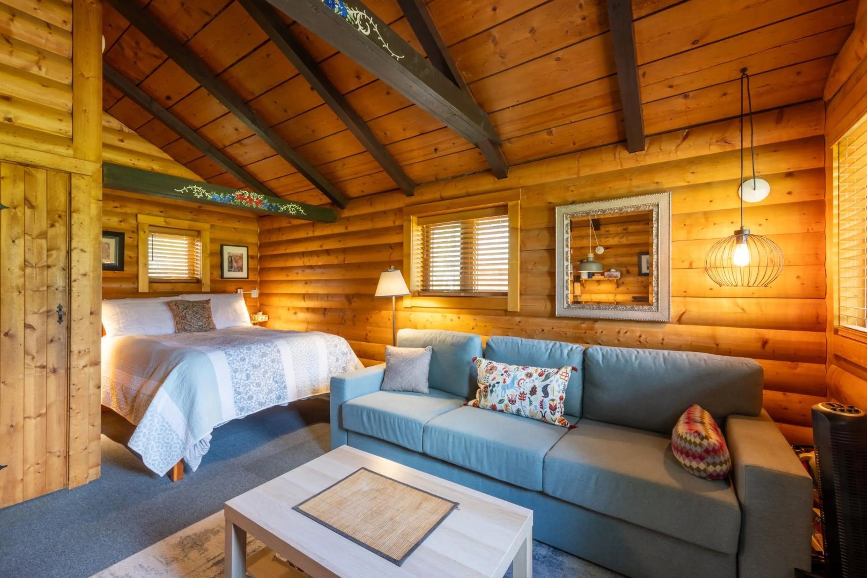 Bed in Rocky Mountain Cabins and Home