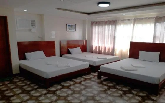 Bed in WMV Hotel & Restaurant
