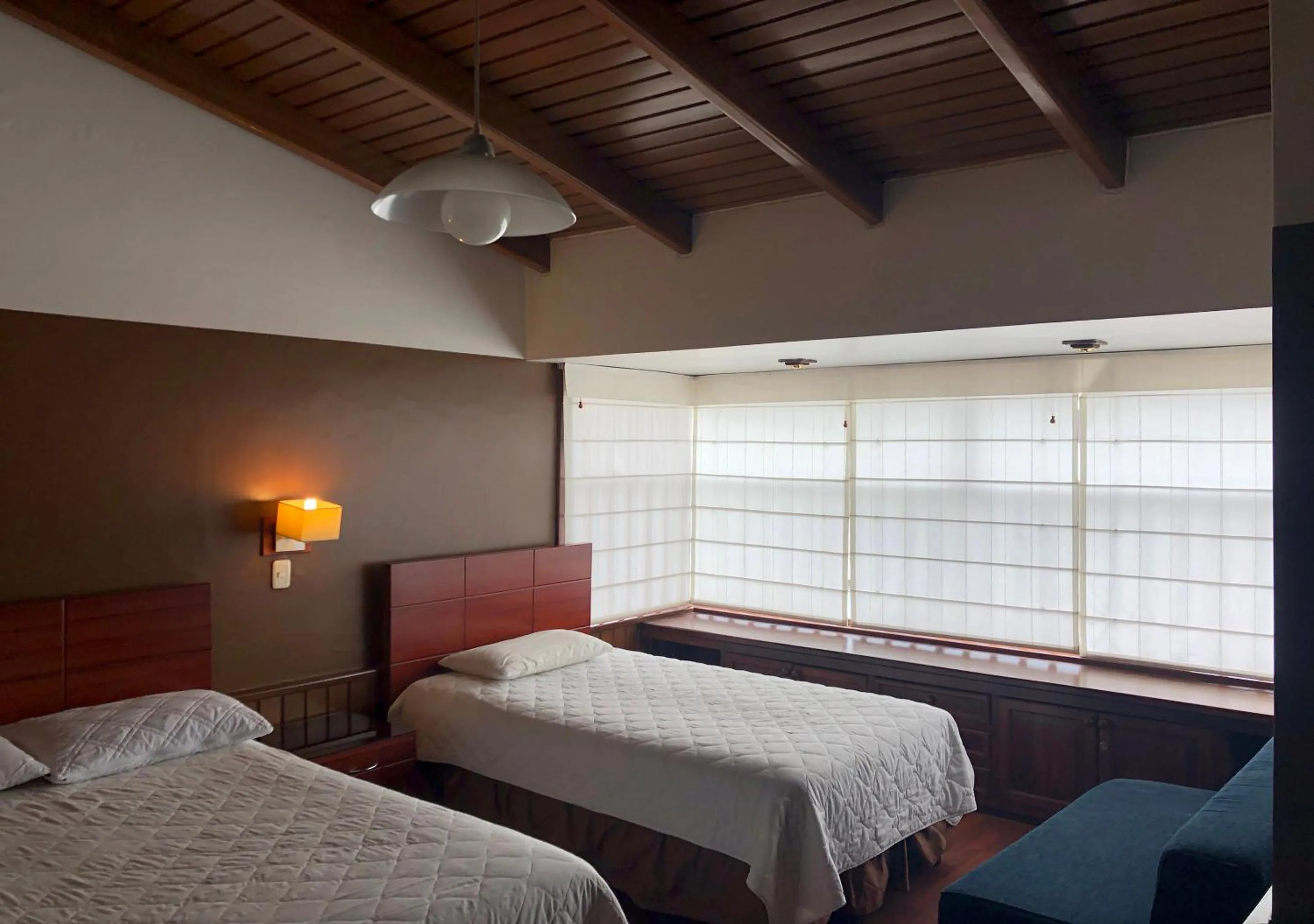 Bed in Filatelia Suites & Travel