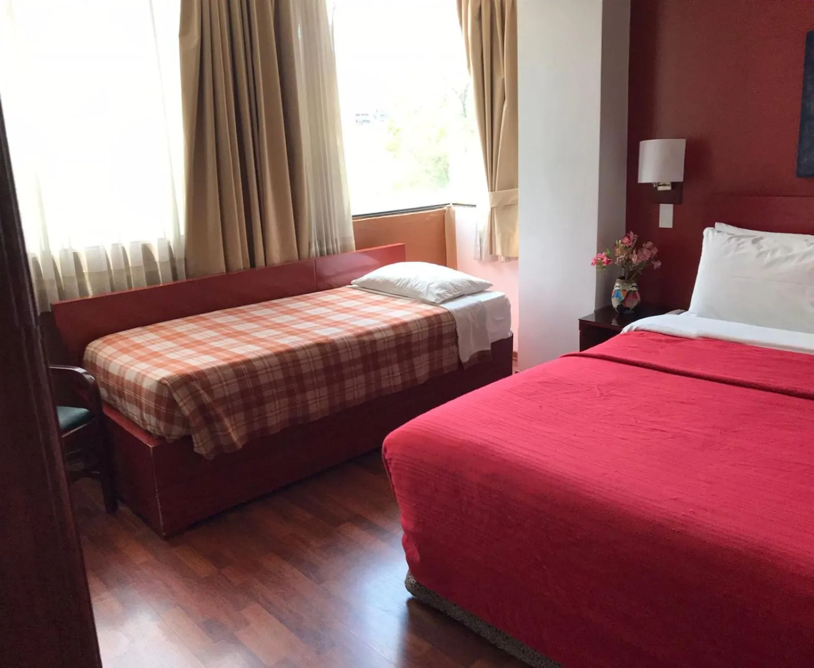 Bed in Filatelia Suites & Travel