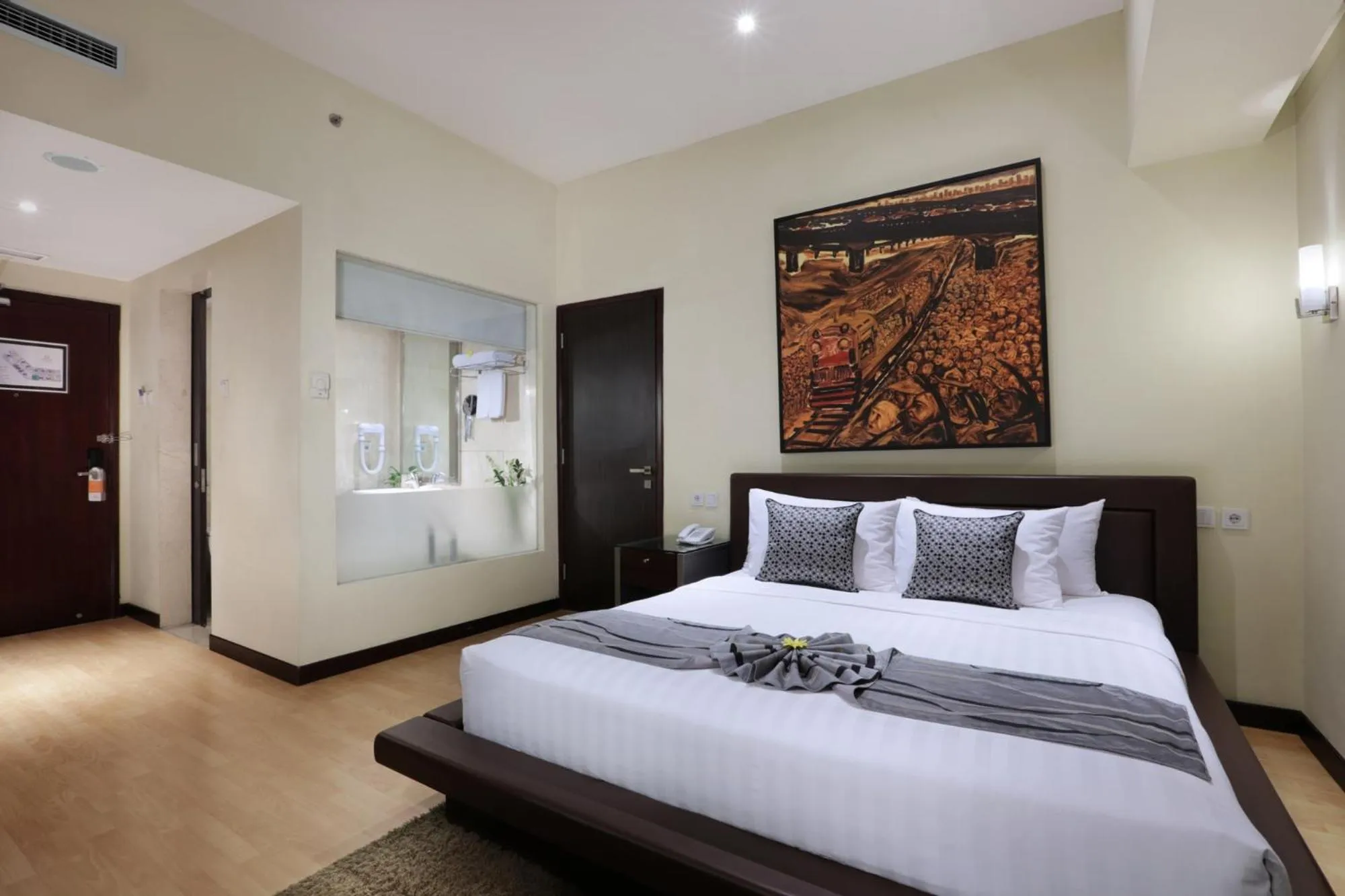 Bedroom, Bed in Grand Candi Hotel