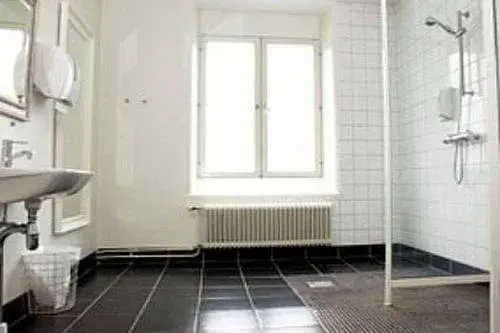 Economy Triple Room with Shared Bathroom in Sidsjö Hotell & Konferens Economy Triple Room with Shared Bathroom in Sidsjö Hotell & Konferens