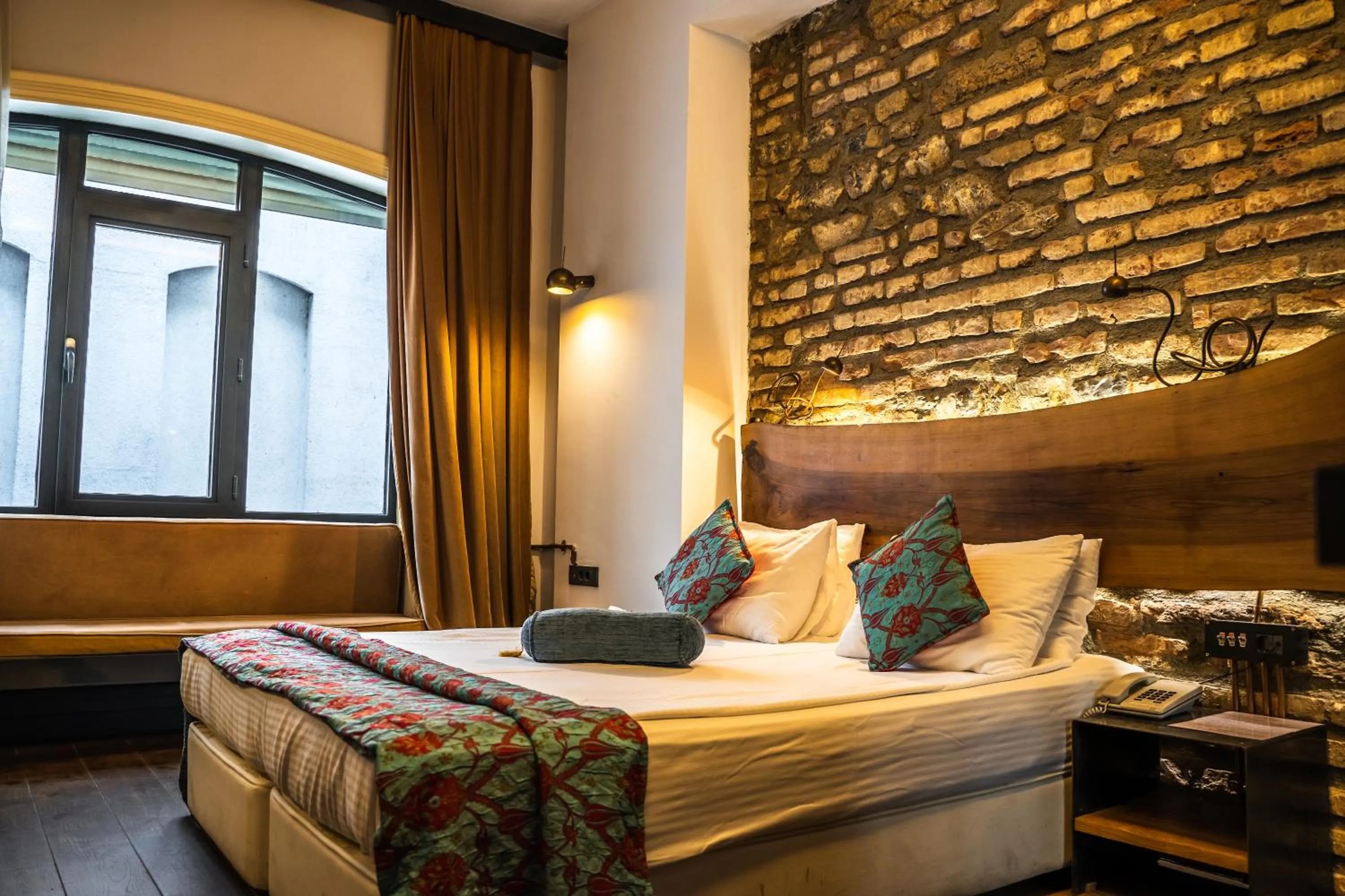 Bed in West Pera Hotel