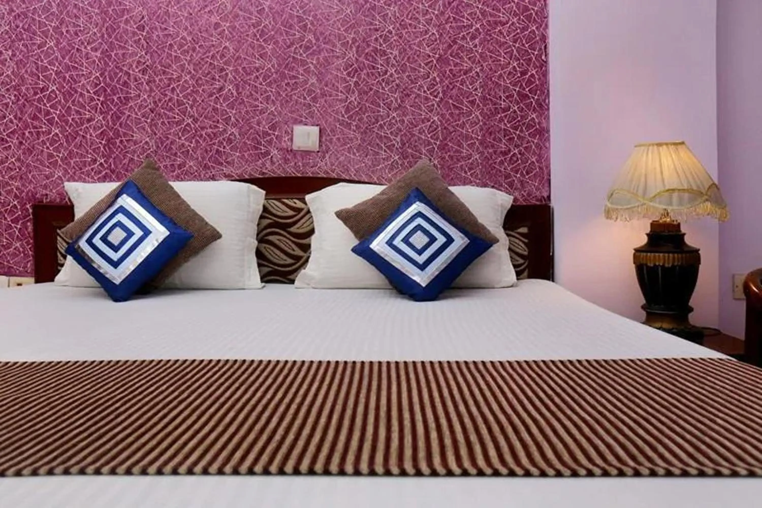 Bed in Hotel Indraprastha