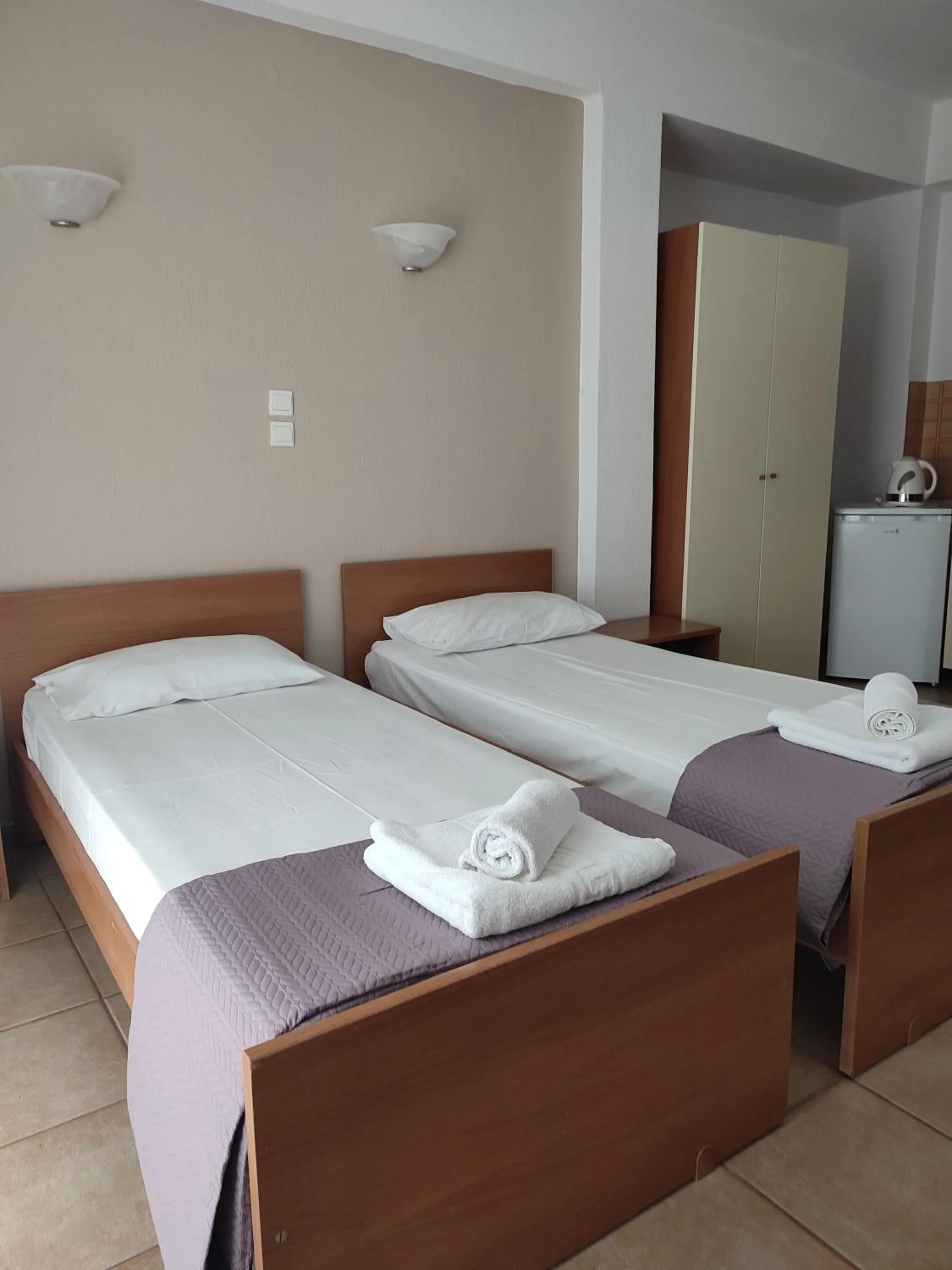 Photo of the whole room, Bed in Bella Grecia