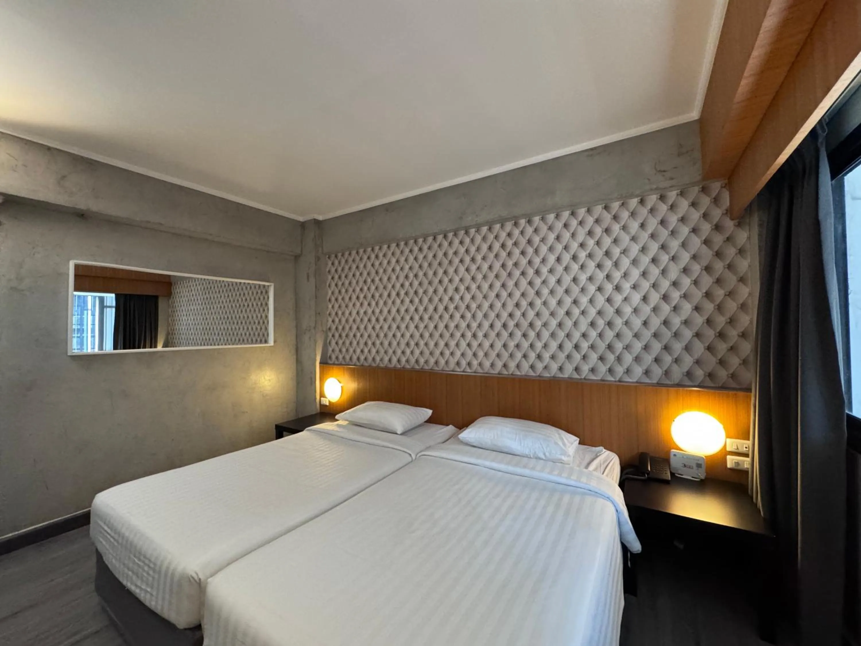 Bed in White Palace Bangkok